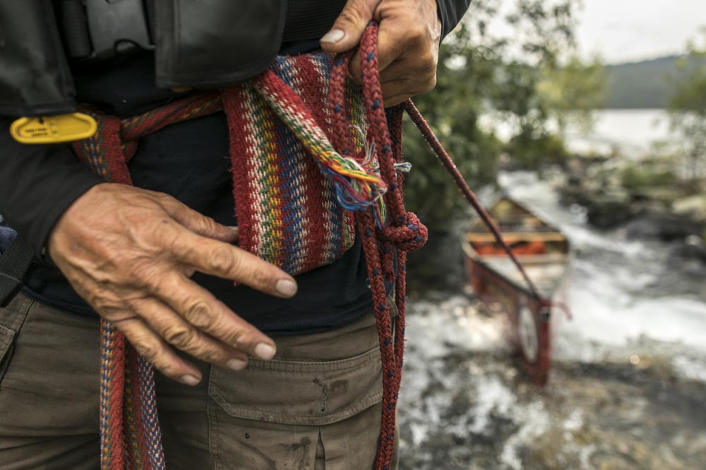Mike Ranta paddles through Knife Lake, carp lake, melon lake, and reaches Janice Matichuck at Cache Bay on Saganaga Lake, Quetico, Ontario. With storms chasing him off the water the following evening on the granite river, Ranta beds down in a cedar swamp. 20170902. Photo/David Jackson