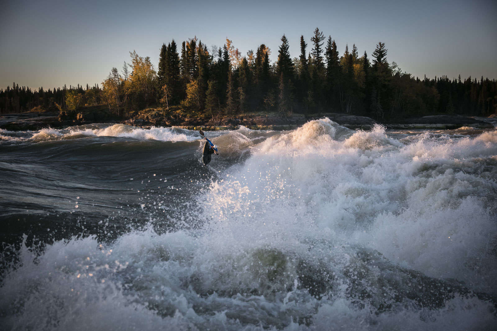  Ben Marr surfs Dream Wave at bladder falls during sunrise on the Nelson River , Manitoba.,Friday September 16, 2016.    Photo/David Jackson 