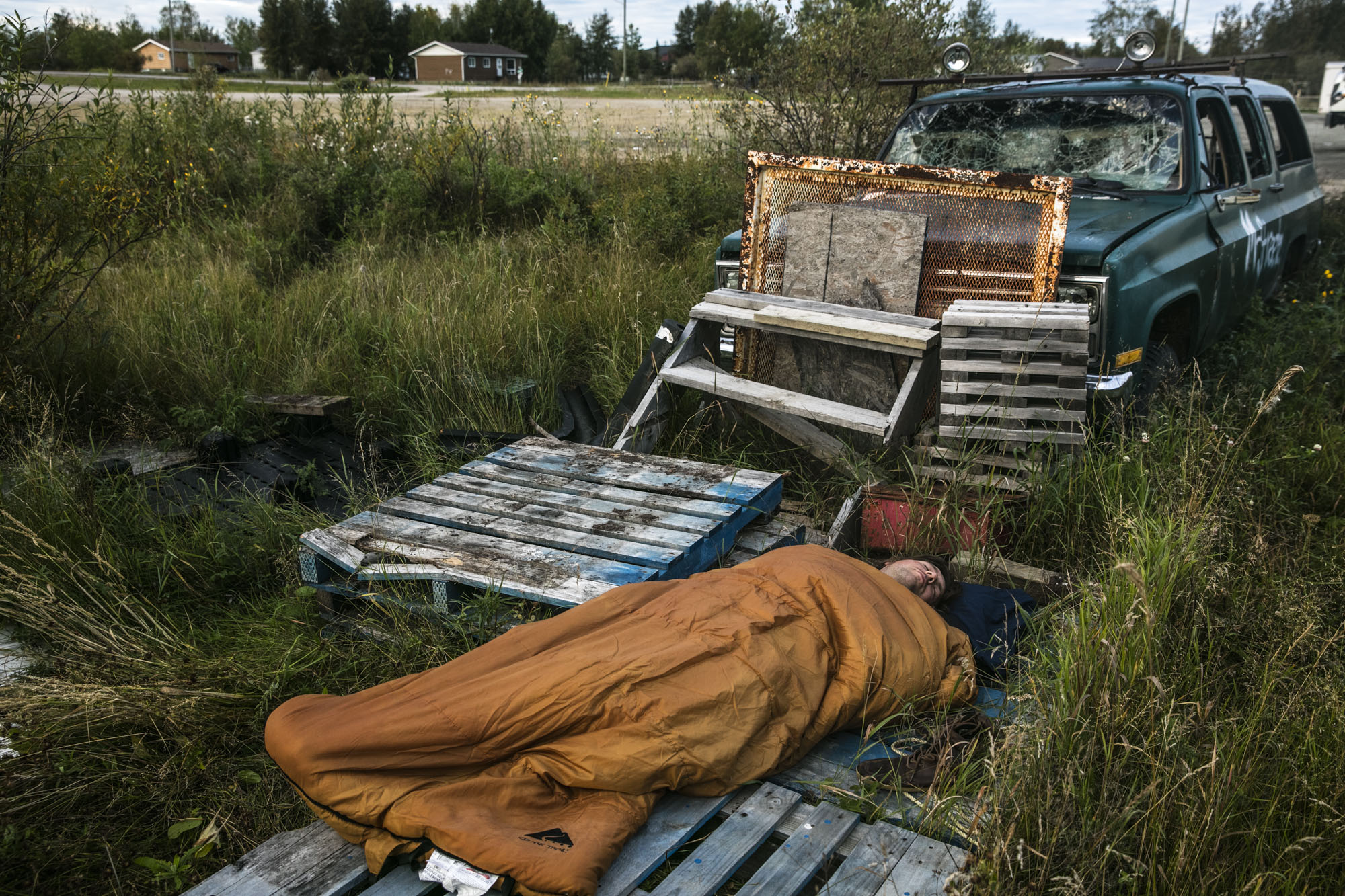  In the town of Cross Lake, Manitoba, Hal Monkman finds a spot to stretch out and sleep after the 40-hour drive north from the Ottawa River. 
Photo/David Jackson
 