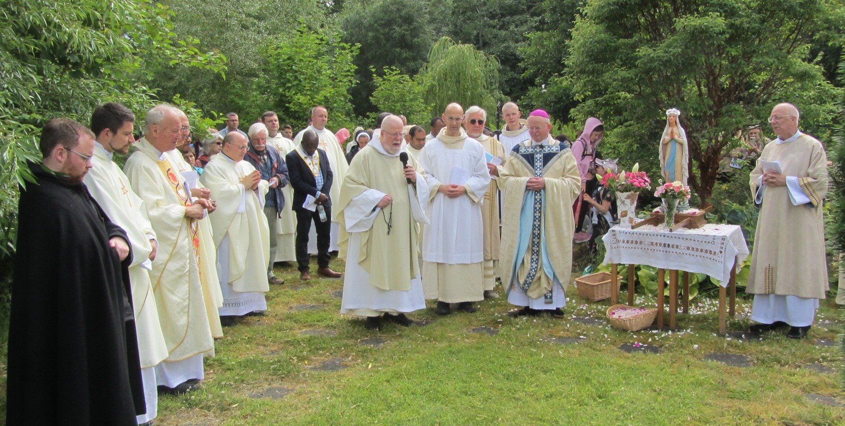 8. Fr. Abbot & the Rosary.JPG