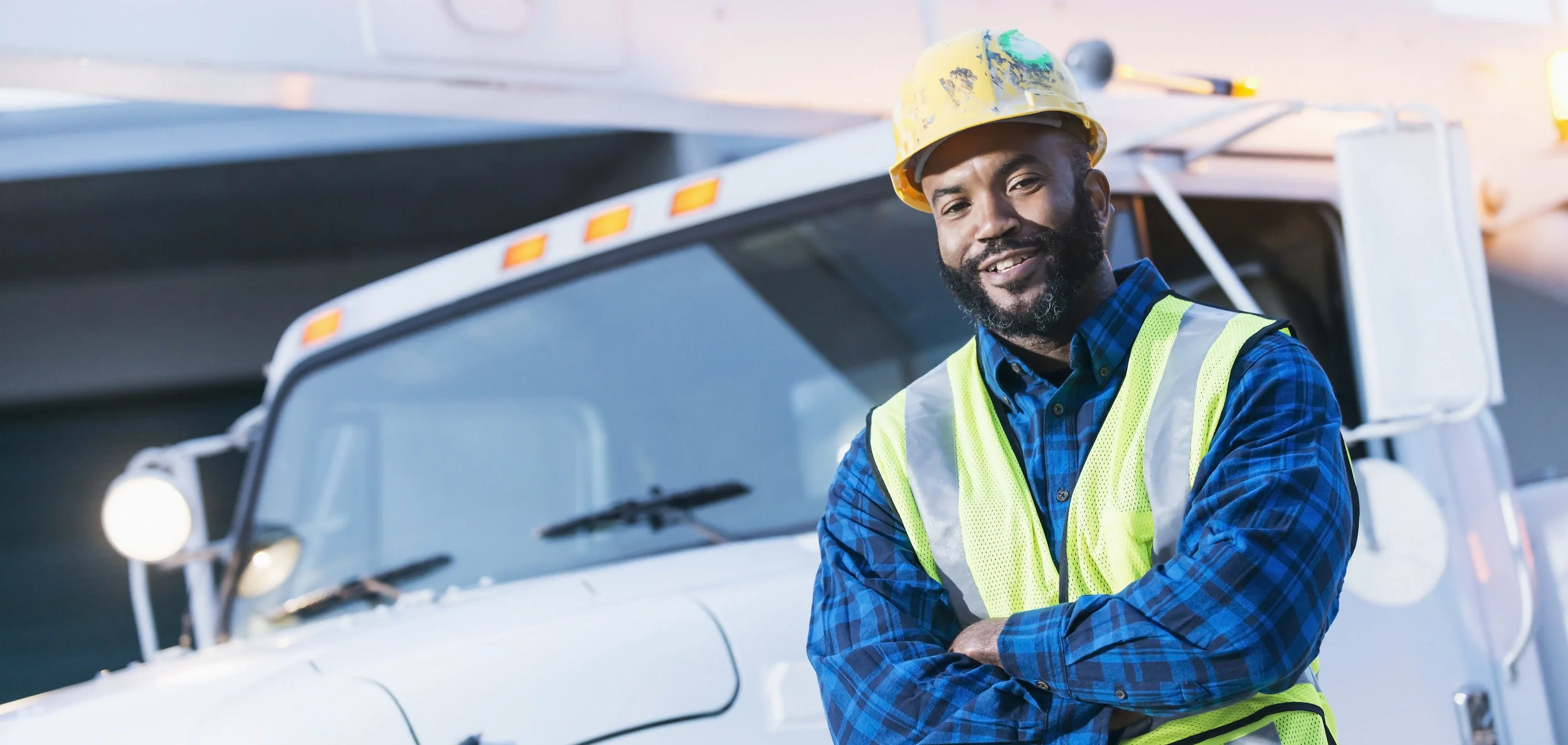 Wise Systems - Homepage Photo of Driver Using Steering Wheel