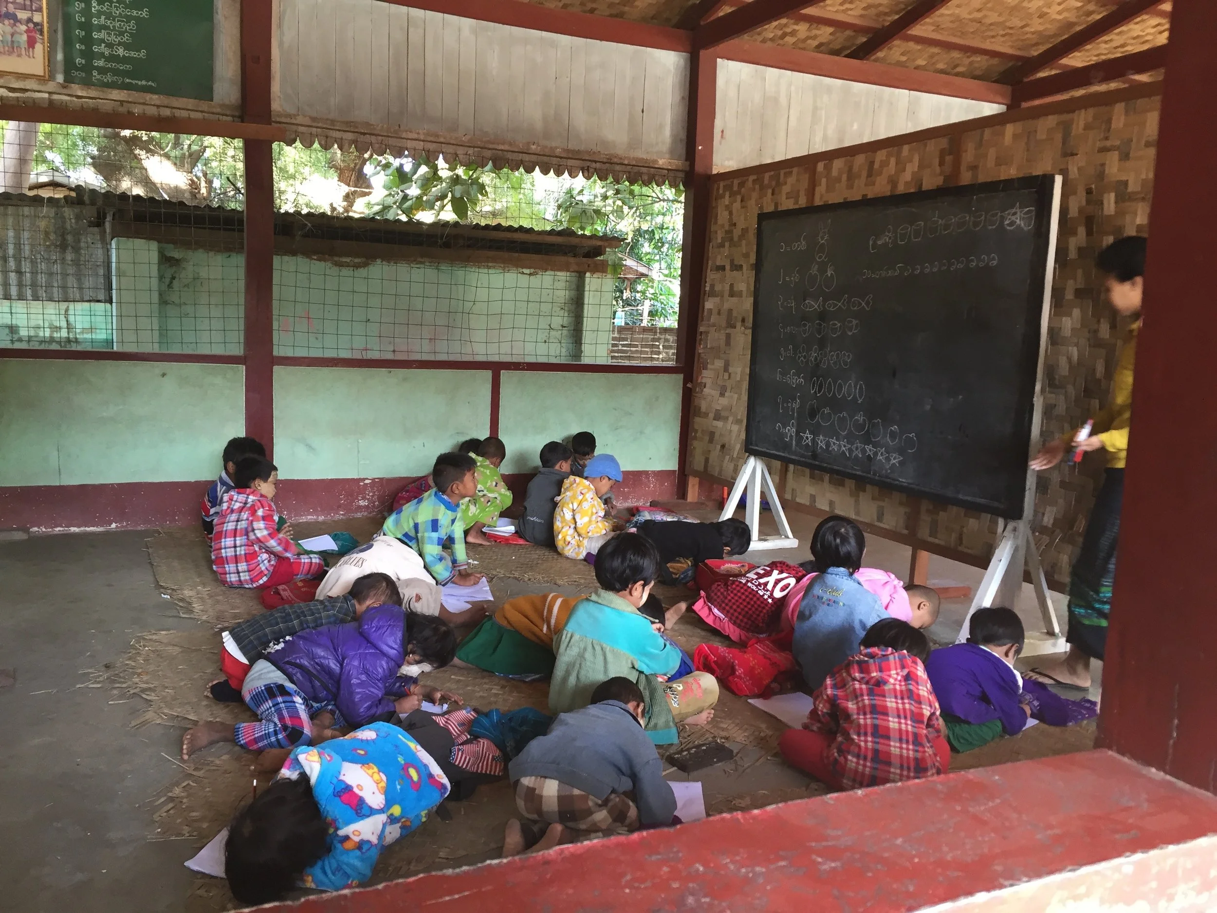 In Bagan, we visited a monastic school to deliver school supplies to the children. This is a group of 6 year olds learning their numbers and beginning arithmetic at that school. We also visited a local volunteer library, where we donated a bunch of children's books. The librarian was the most incredible woman, she not only set up a library and reading program for the local children (all donation based) but in order to make money she also teaches English classes to locals and cooking classes to tourists that she meets at the nearby hostels. 