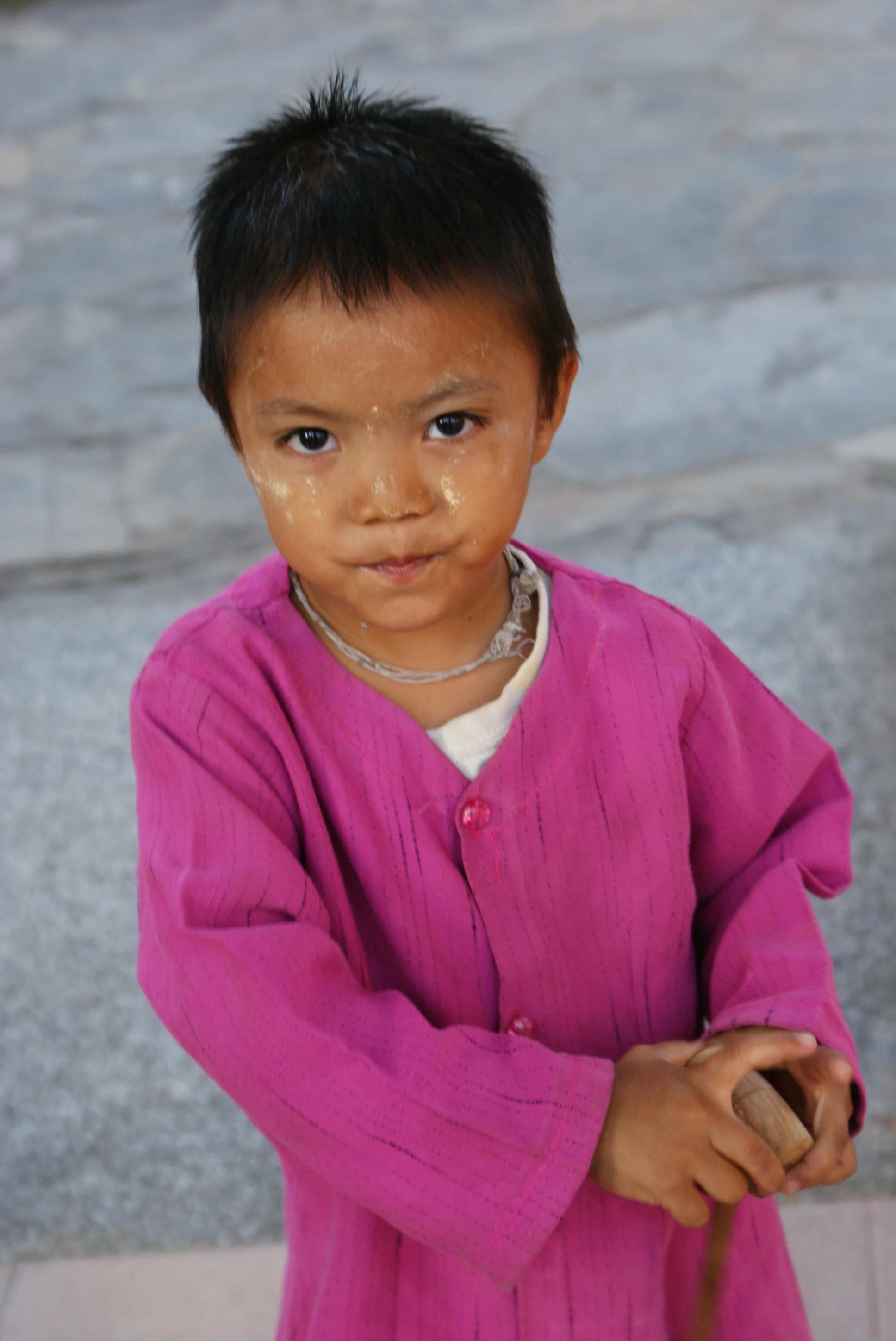 I found this girl near the teak temple in Mandalay, the markings on her face are the remnants of thanaka root which is fashionable in Myanmar. The root supposedly acts as a sunblock, moisturizer, and stops aging. I put it on the back of one of my hands for a portion of the trip, and I agree it definitely lives up to the hype. My one hand was felt smooth like it had sat in a paraffin bath for a month.