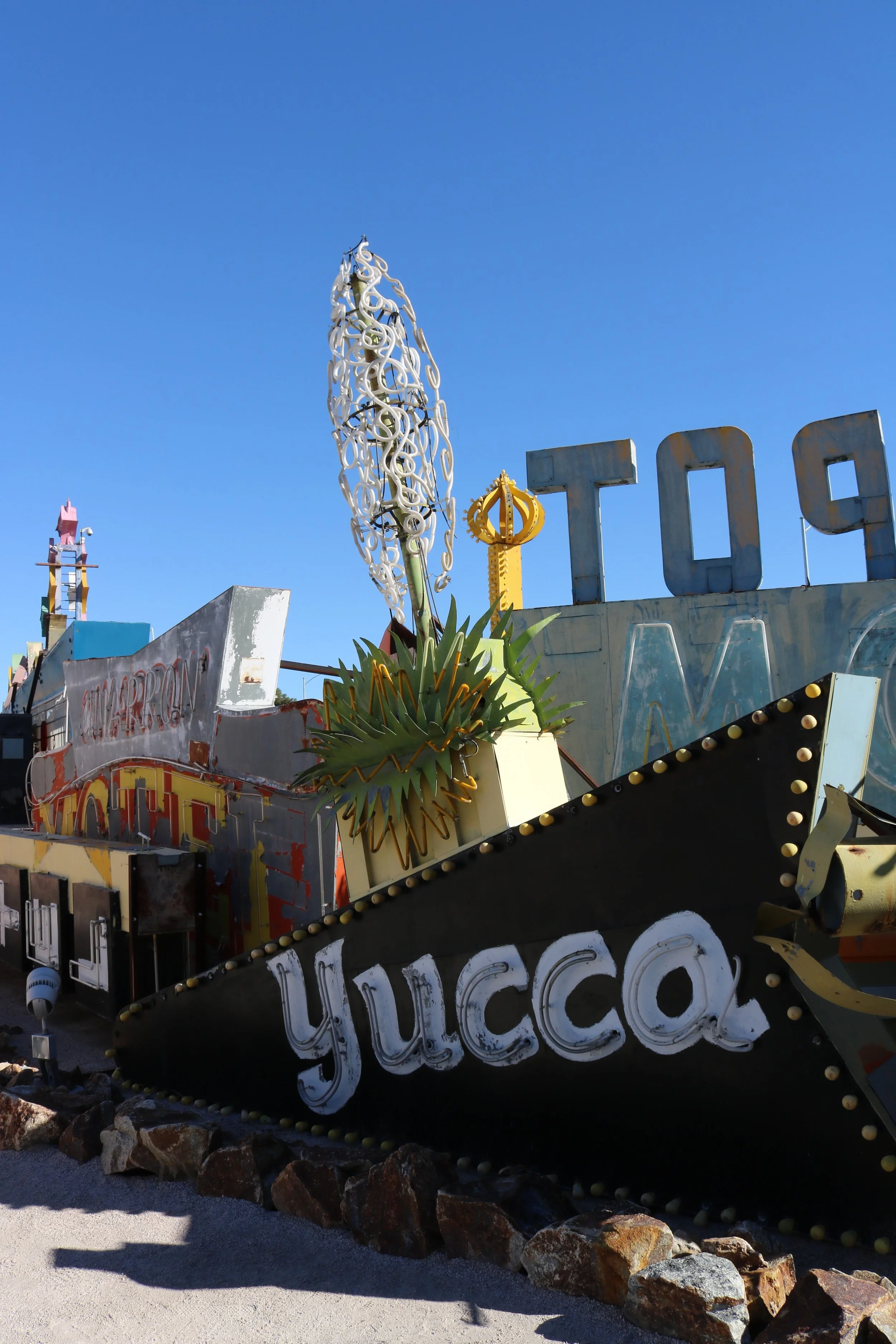 The Yucca Hotel Sign at the Neon Boneyard, is next level neon craftsmanship. Each one of the pieces in the plant part of the sign were individually hand crafted. I WISH I could see what this sign looks like lit up, I bet it's amazing.