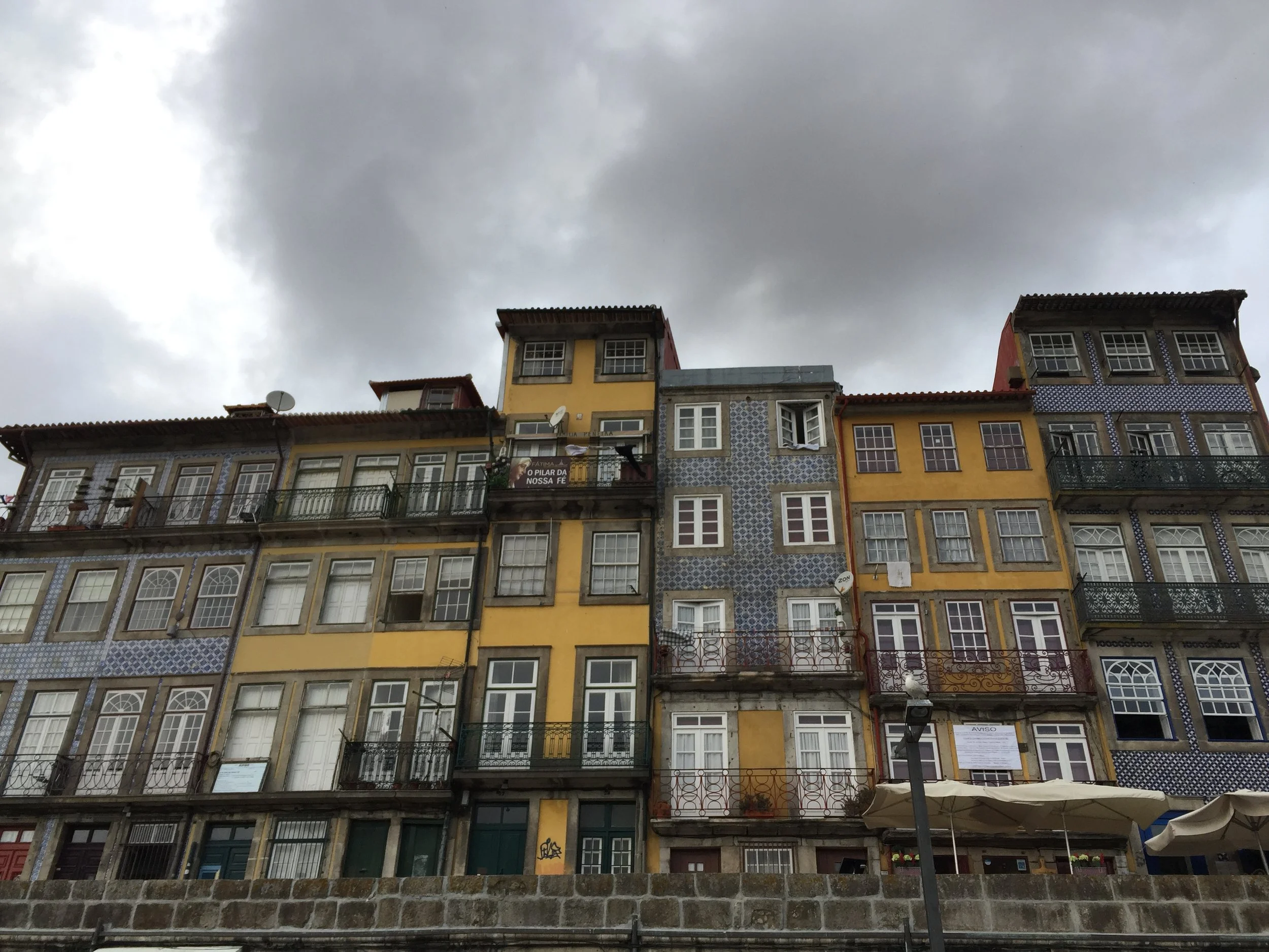 A week in Porto and I'm dreaming of brightly covered tiled homes. How pretty are these apartments? And I should mention, they are in a not so great part of town...look at what a little tile can do.