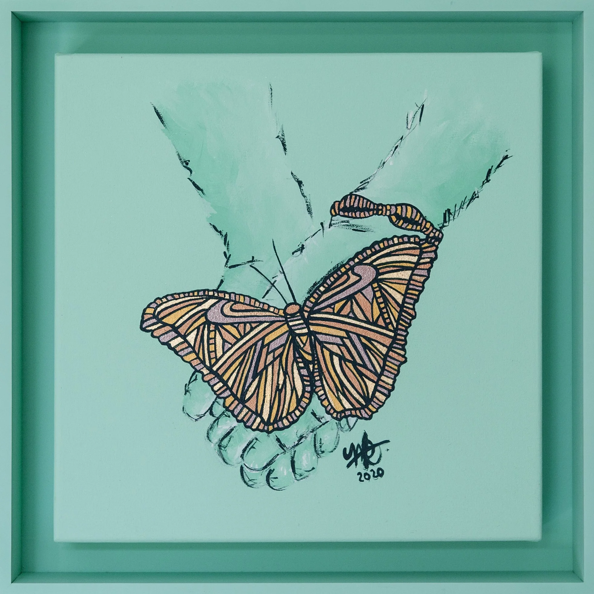 A colorful illustration of a monarch butterfly perched on a human hand with a light turquoise background, framed in a matching turquoise border.