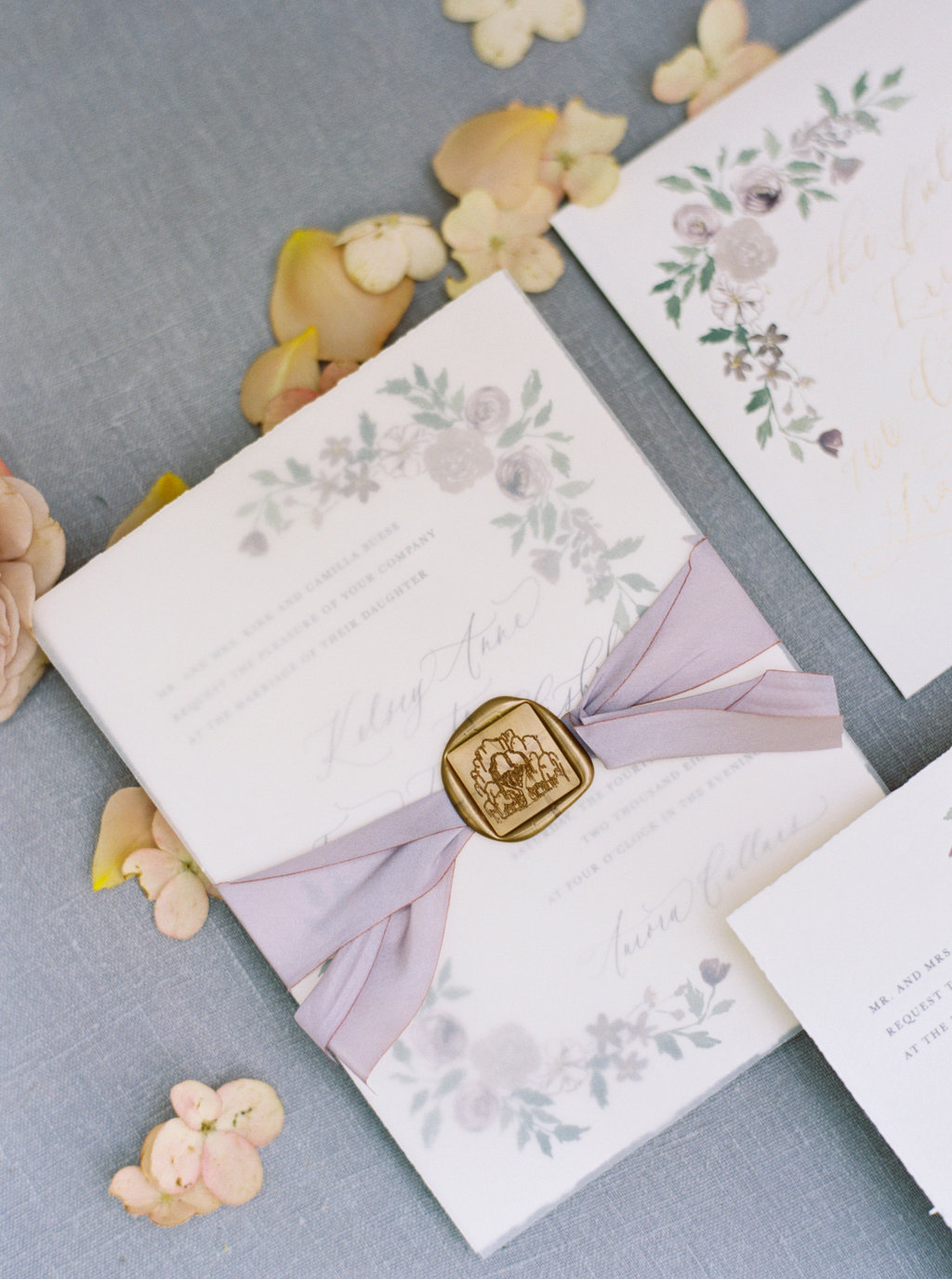 Custom wax seal and silk ribbon for custom wedding invitations.