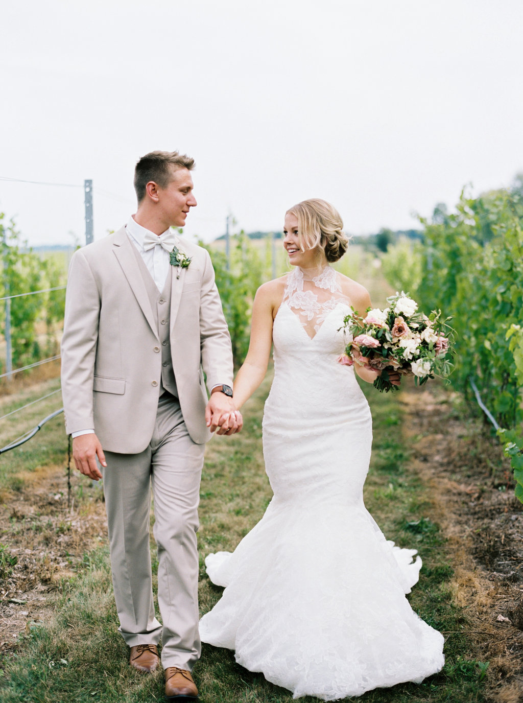 Bride and groom vineyard portraits for an aurora cellars