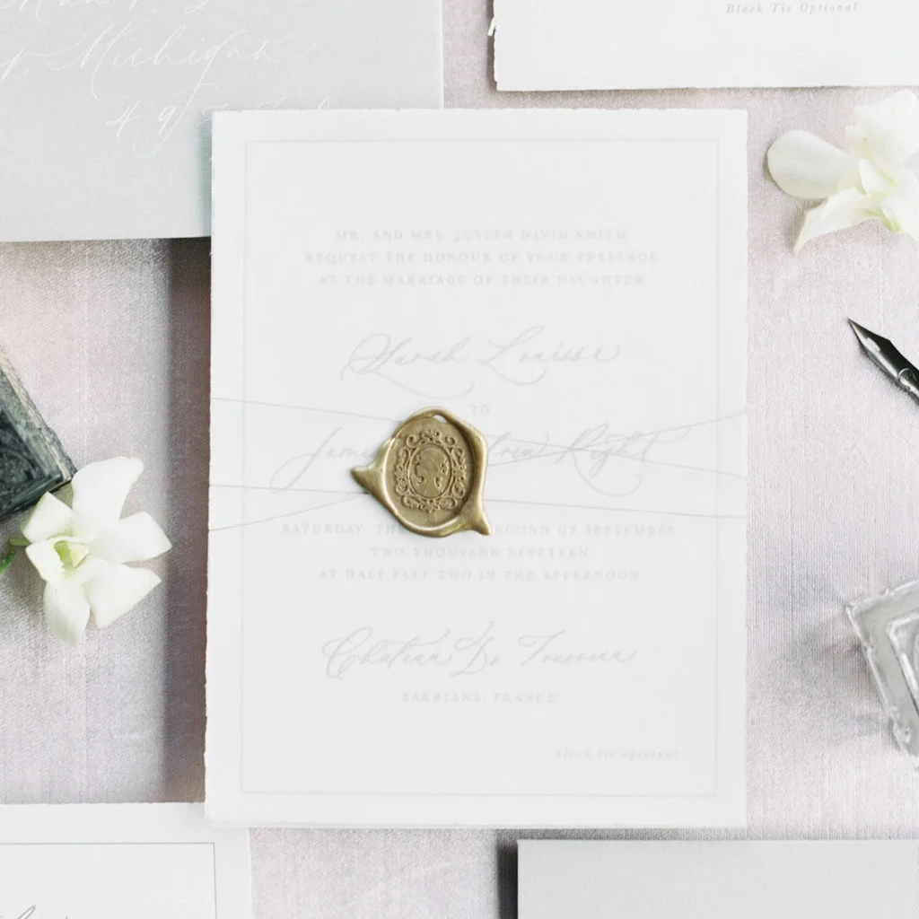 Assembly details for wedding invitations. Custom wax seals, twine, ribbon, vellum, etc.