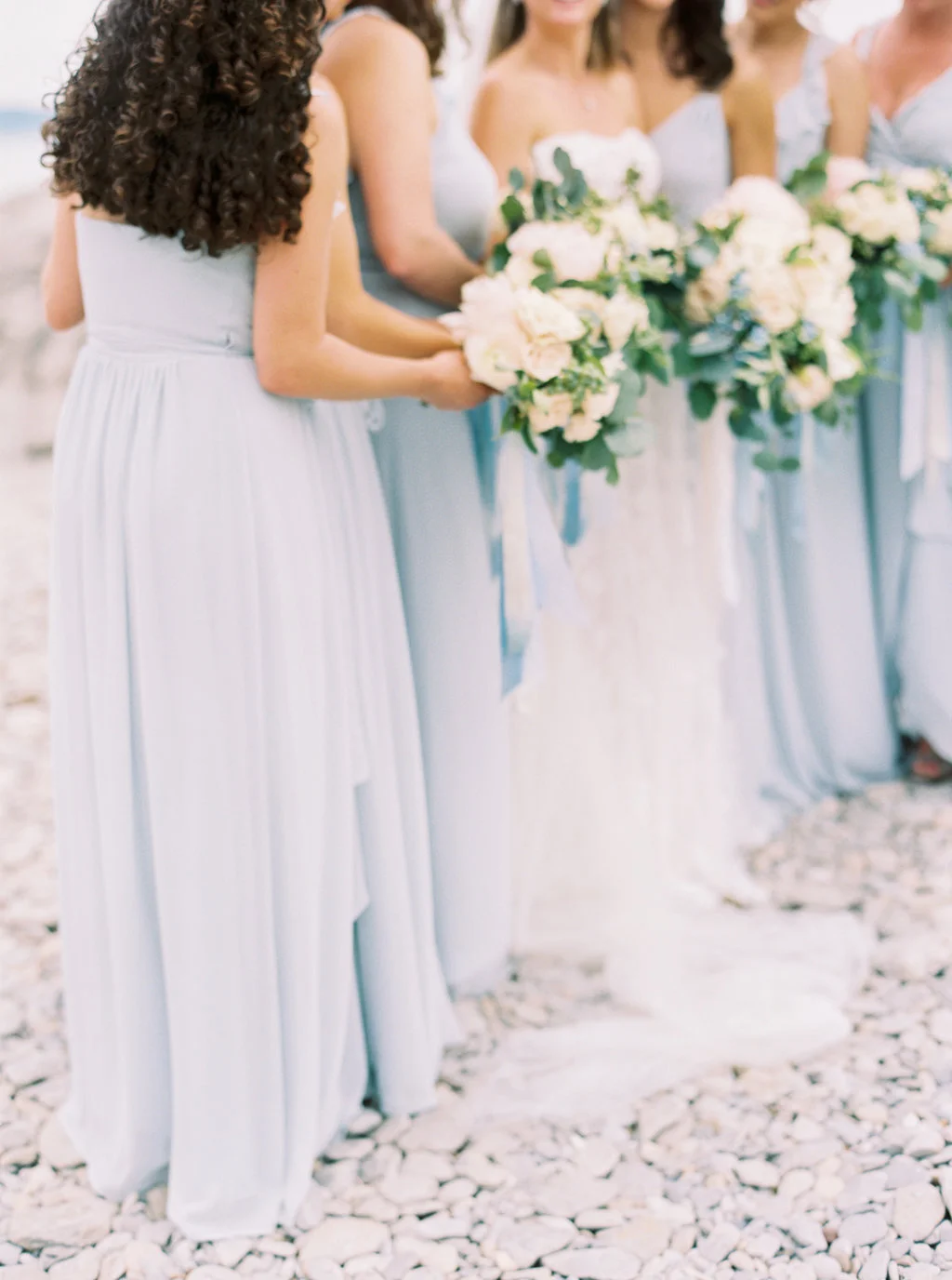 Dusty blue bridesmaid dresses for a summer wedding in Northern Michigan.