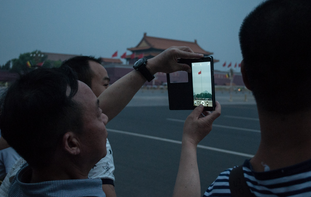 Flag Lowering ceremony in Tienanmen Square, Beijing, China. The ceremony is a daily occurrence.