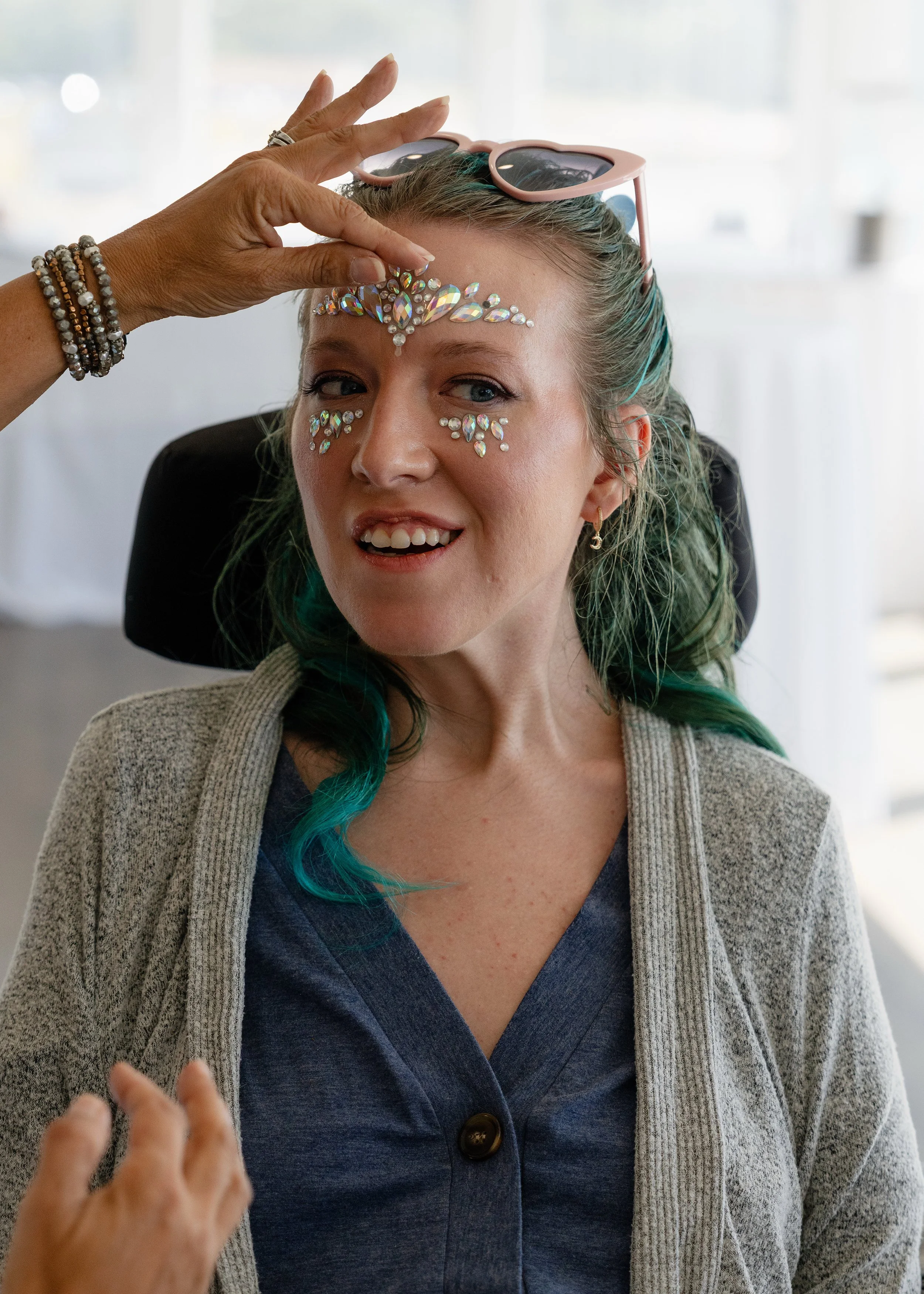 Laura McNew-Isaacs, 35, getting her makeup done ahead of a dinner and a show.