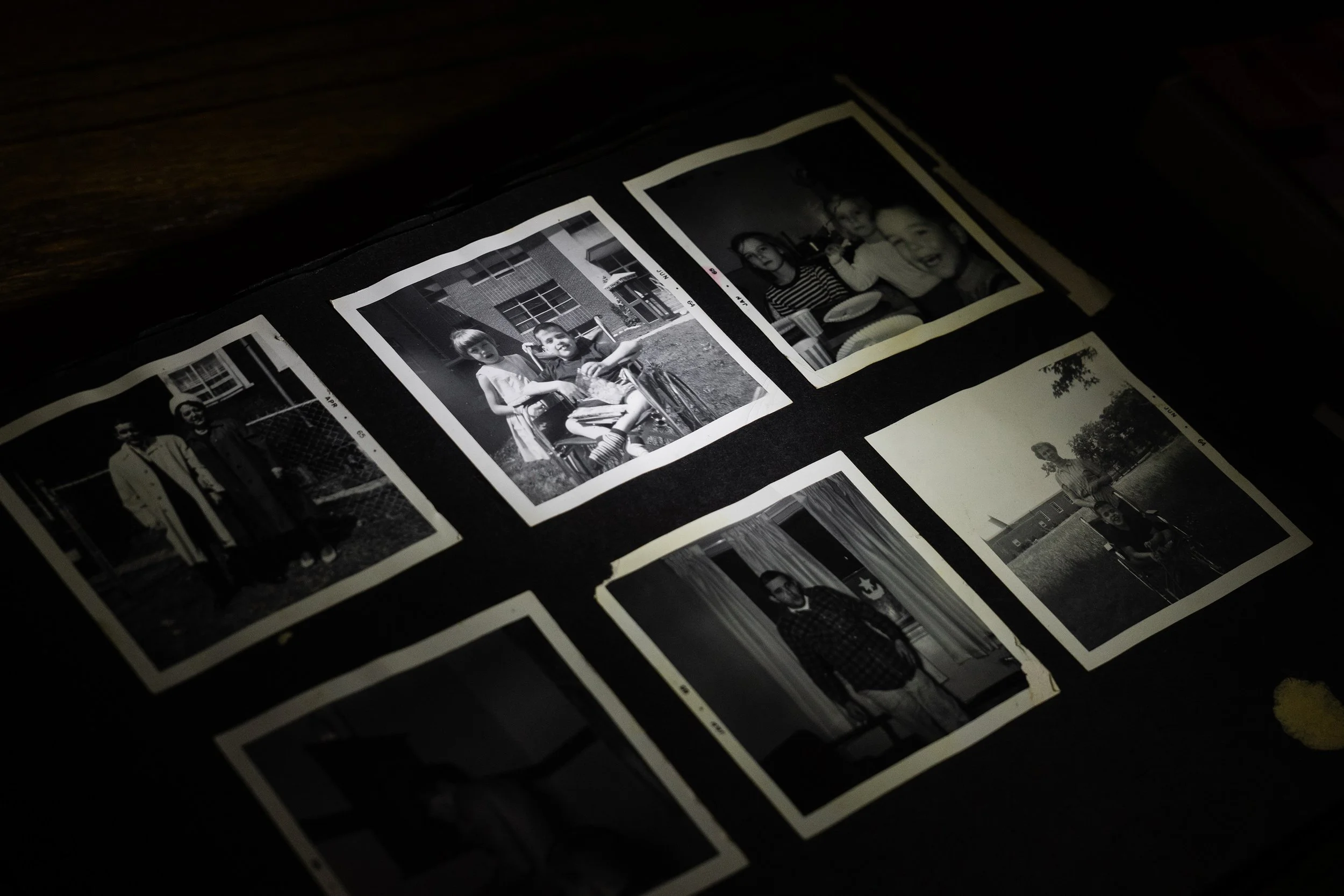 John Scott had a severe form of spina bifida. He was 18 days old when he was admitted to the Walter E. Fernald State School in Waltham, Massachusetts. David Scott keeps his brother's photos in an old family album.