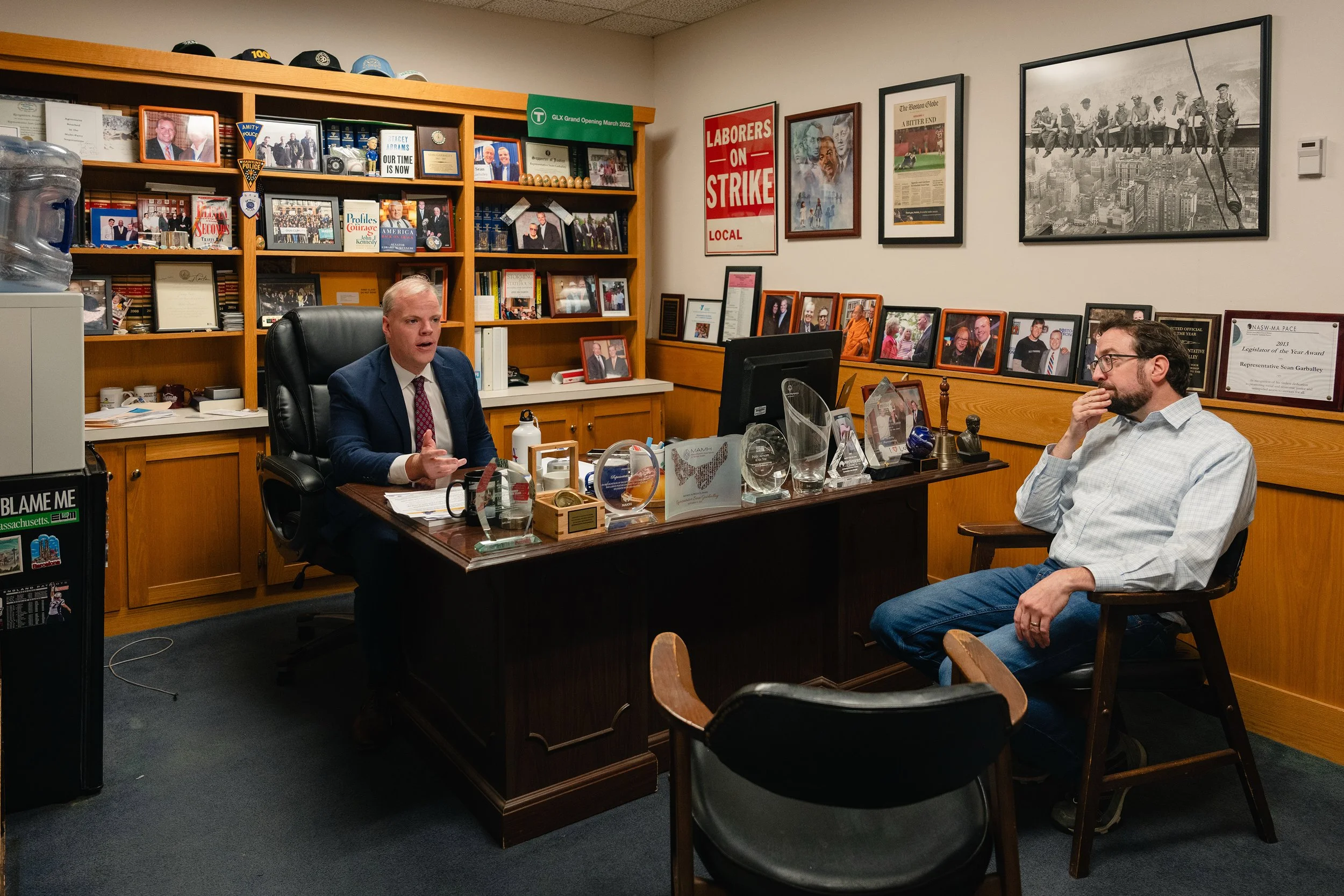 Massachusetts State Representative Sean Garballey speaking with Alex Green in his office at the Massachusetts State House. Green has been working with Garballey to remove legal barriers that prevent families of the Fernald School’s residents to gain 