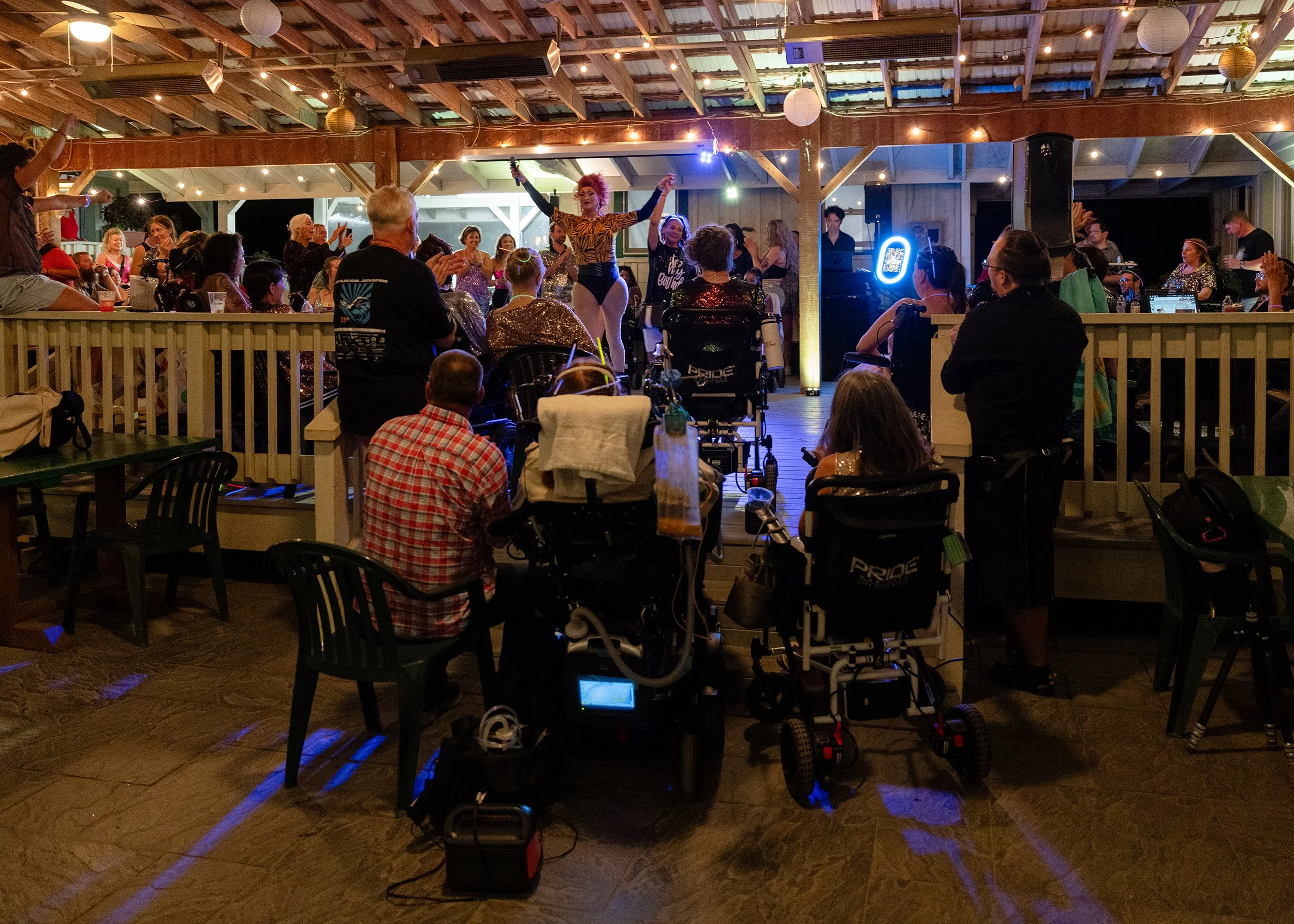 Attendees and their families end the night with music and a drag show.