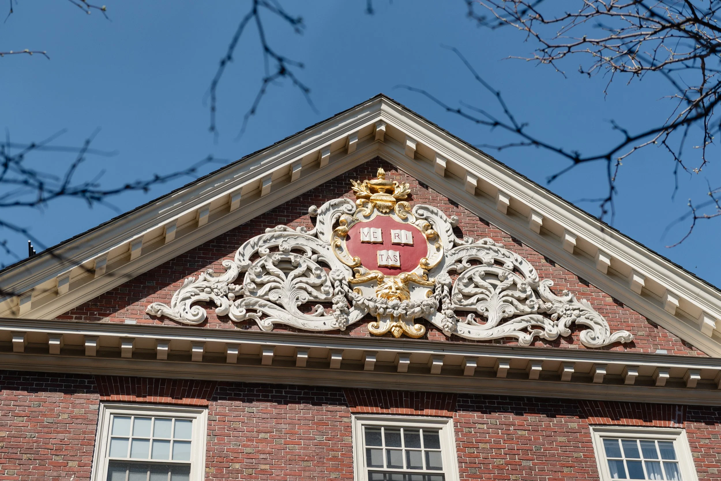 The Harvard motto atop Lowell House on campus.
