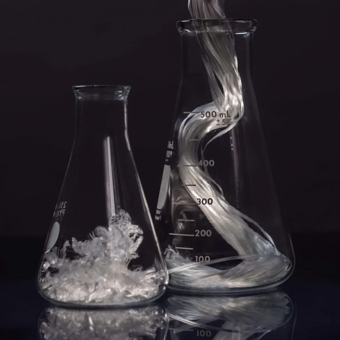 fiber in beakers re-touched dark.jpg