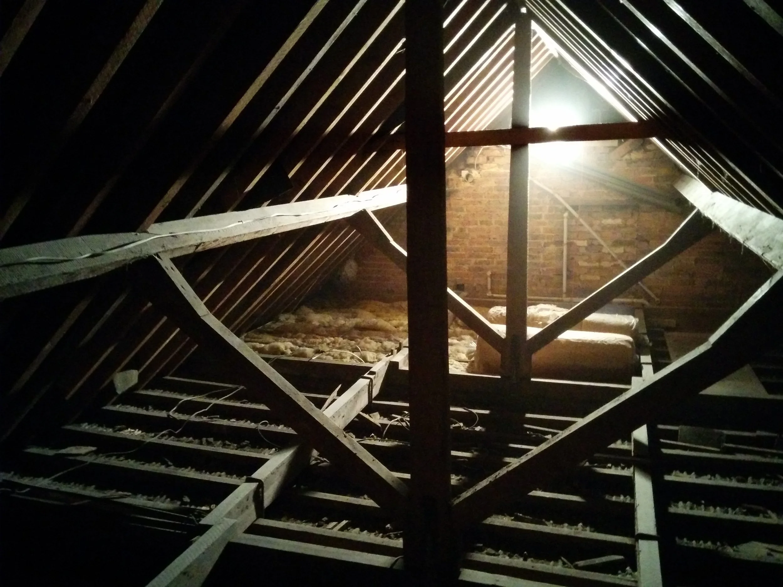 And this is the roof space. If it looks clean, believe me it was not. 100 years of plaster dust and squirrel droppings made for some unpleasant crawling about.