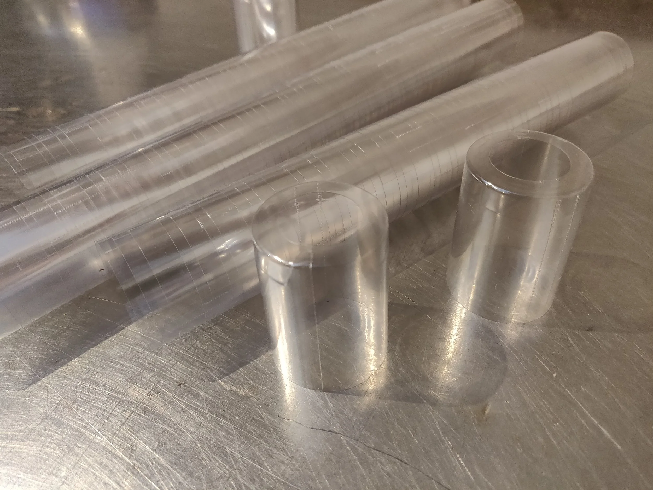 PVC shrink capsules. To be replaced with PLA or discarded altogether.