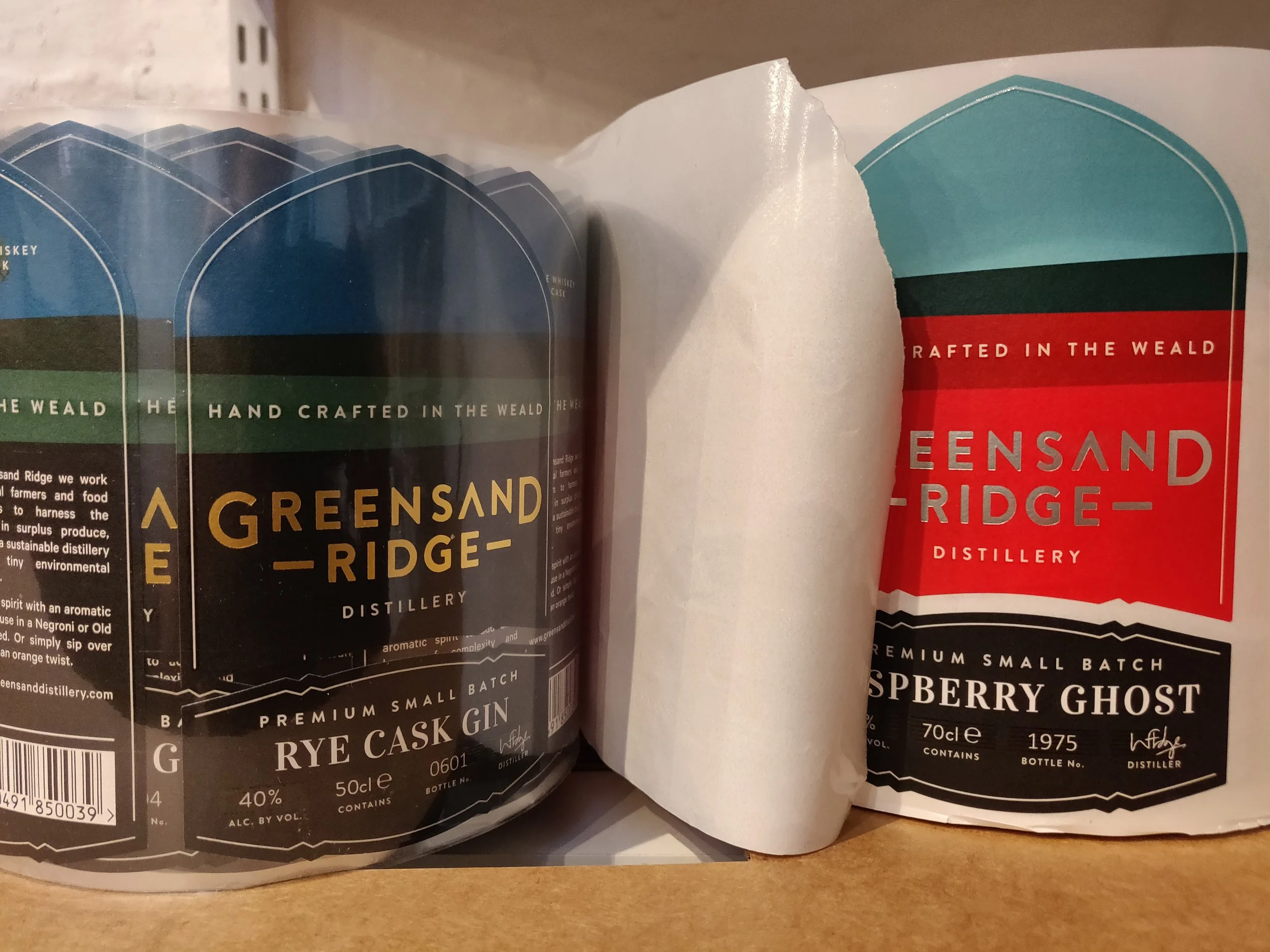 Glassine backing paper (right) replaced with recyclable PET (left)