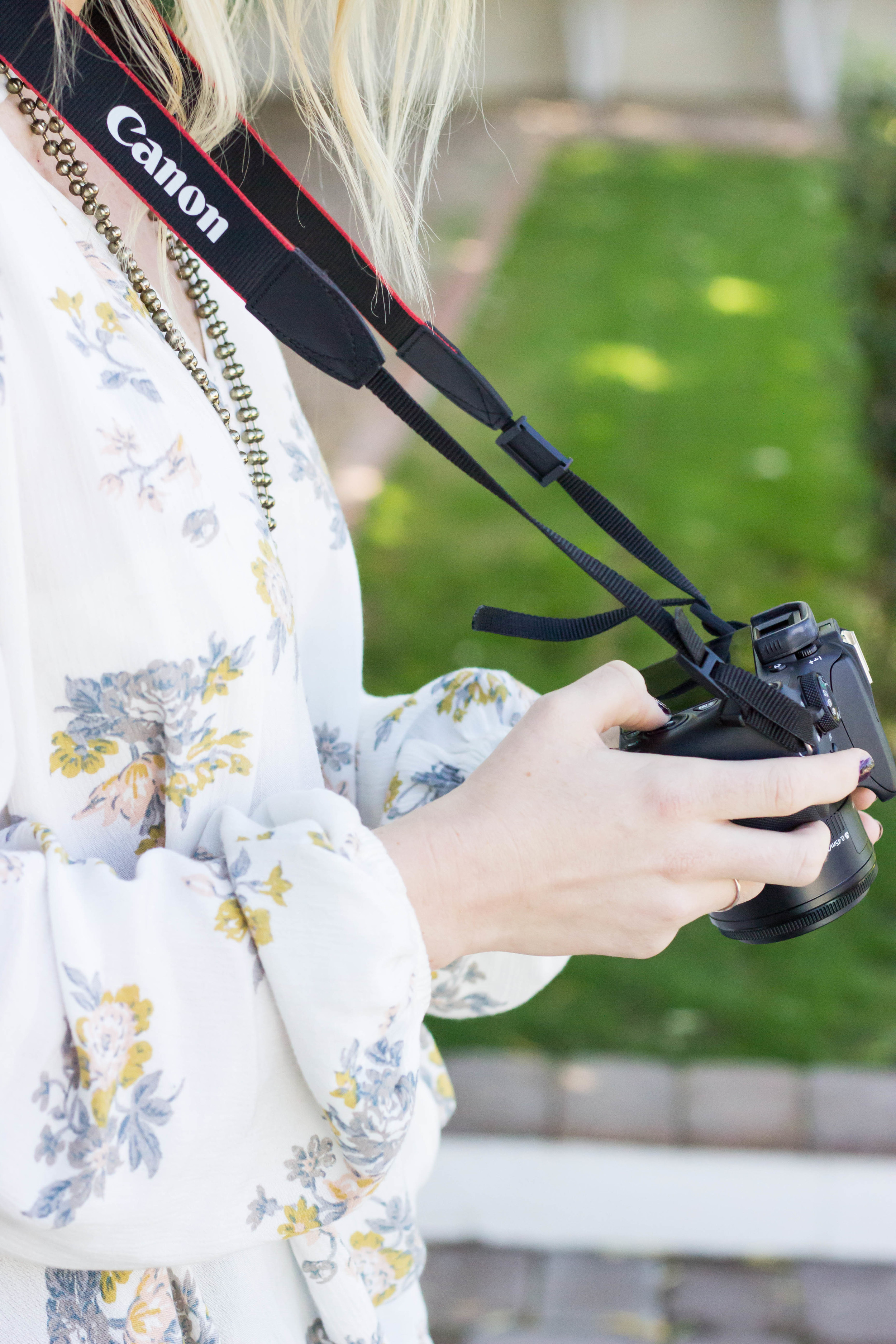 Woman with a DSLR Camera