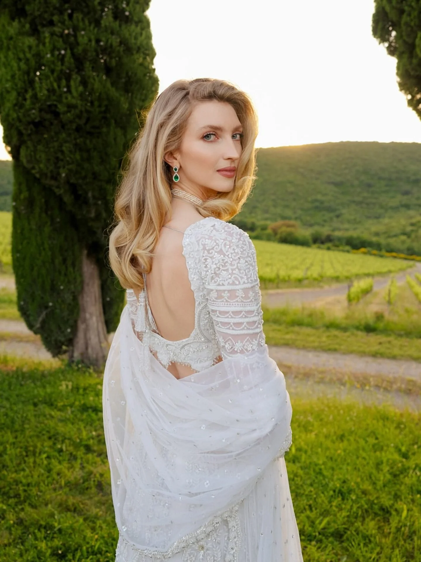 Tuscany cradled this celebration in its sun-soaked hills, where rows of vines framed a table dressed in earth&rsquo;s palette. Artichokes, figs, grapes, and garden greens spilled across linens like a quiet ode to the land. Olivia &amp; Shaan invited 