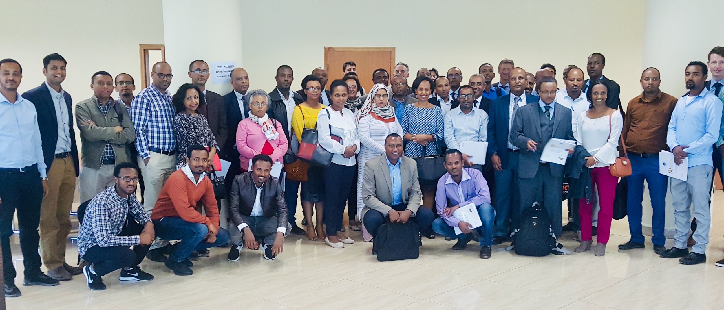 participants in workshop launching ethiopia ncdi poverty report.