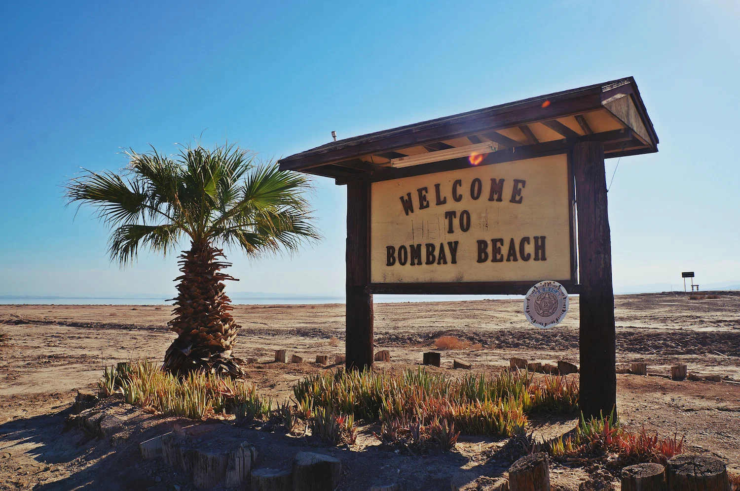 This sign that once welcomed tourists to a resort destination, today welcomed us to a ghost town.