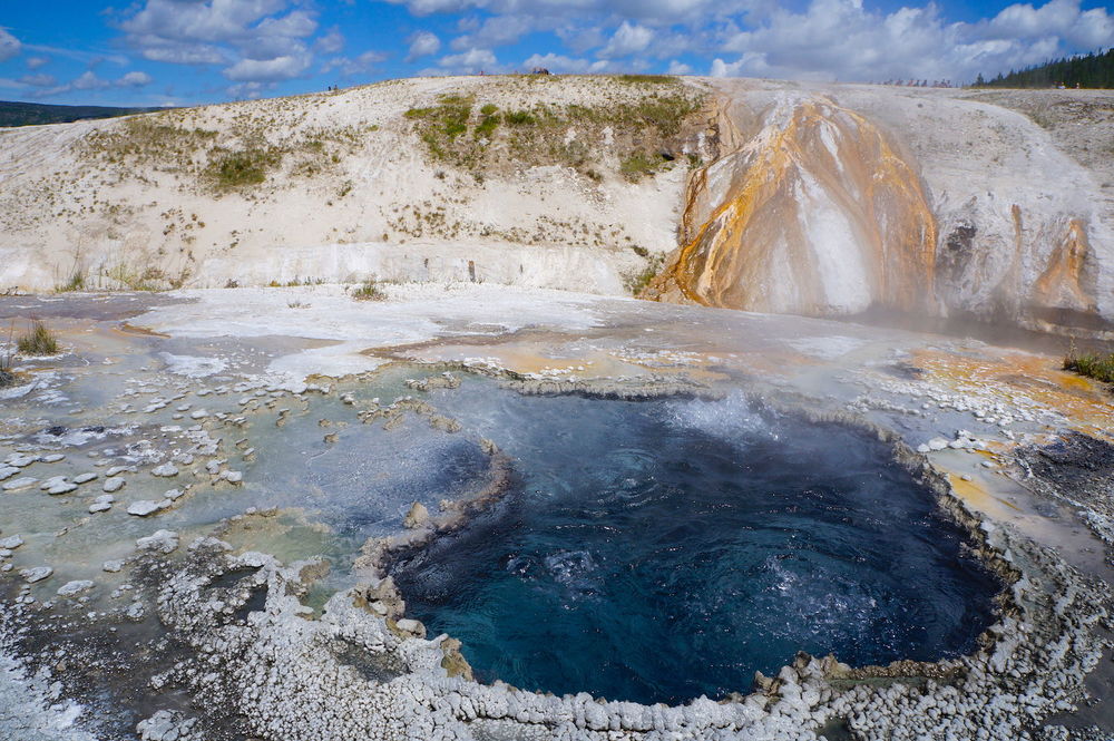  One of many spectacular hot springs along the boardwalk near  Old Faithful  ,  Yellowstone's biggest, regular geyser. 