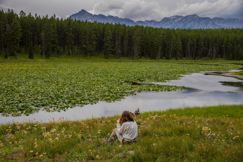  We sat in the tall grass and wildflowers to soak in the beauty of the pond and mountains around us. 