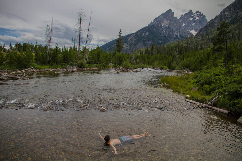  François braving the cold water at String Lake. &nbsp;Look at that view. 