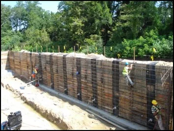 Soldier Pile Retaining Wall with Cast In Place Concrete Facing