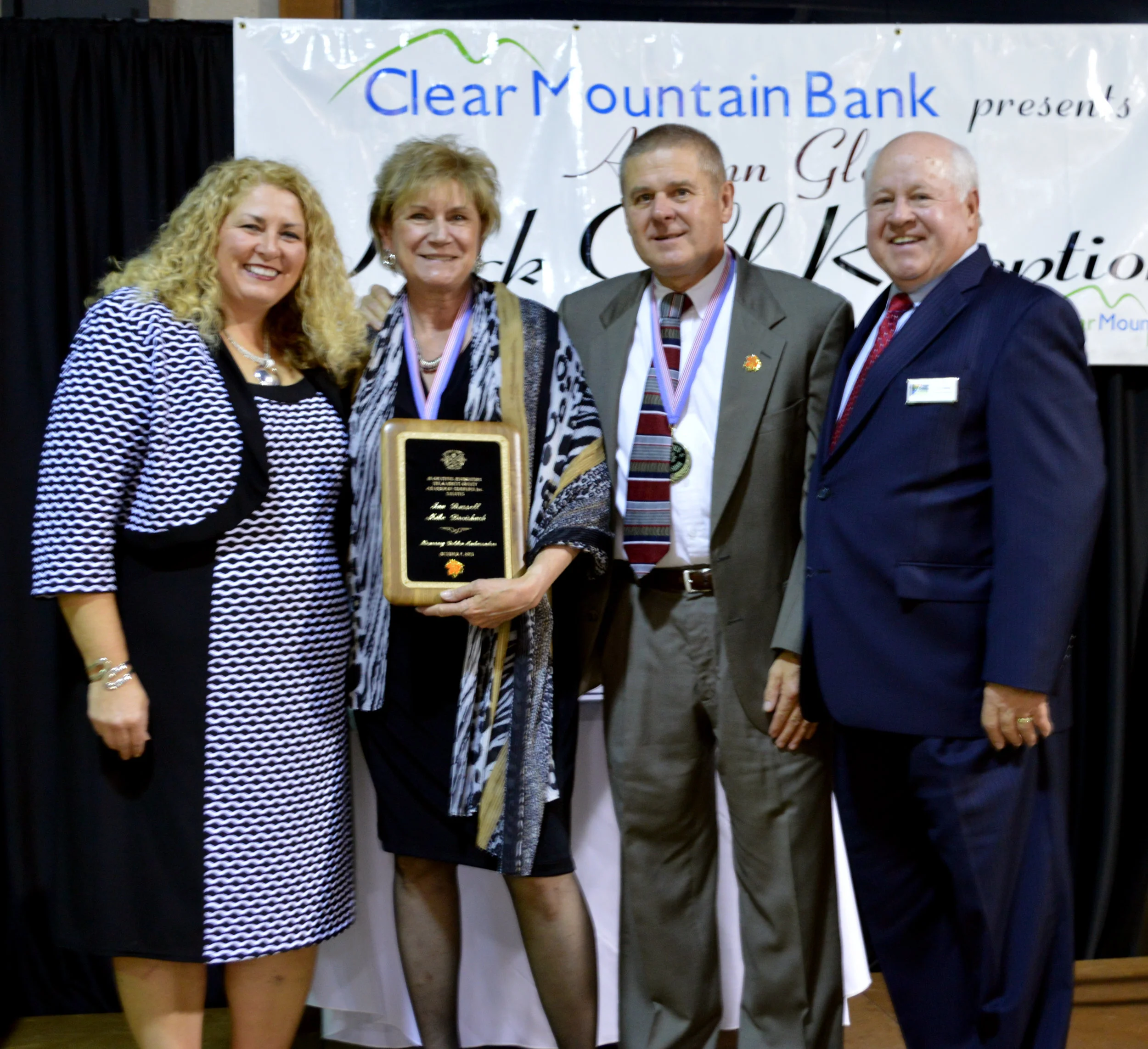 Garrett County Chamber of Commerce President & CEO Nicole Christian, Jan & Mike, and Chamber of Commerce Board Chairman Jim Bailey