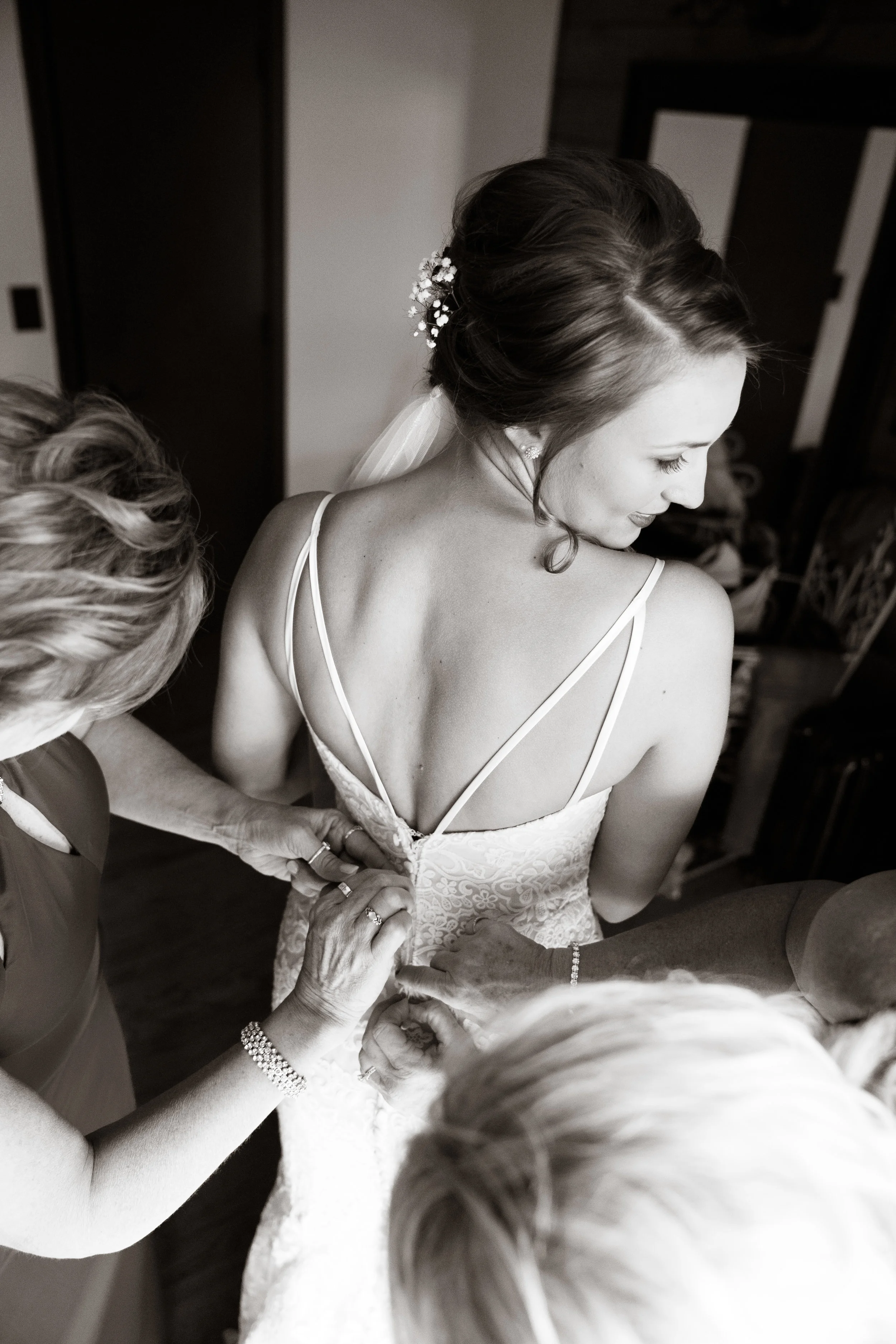 Bride getting in dress - Viewpoint at Buckhorn Creek | Greenville, SC