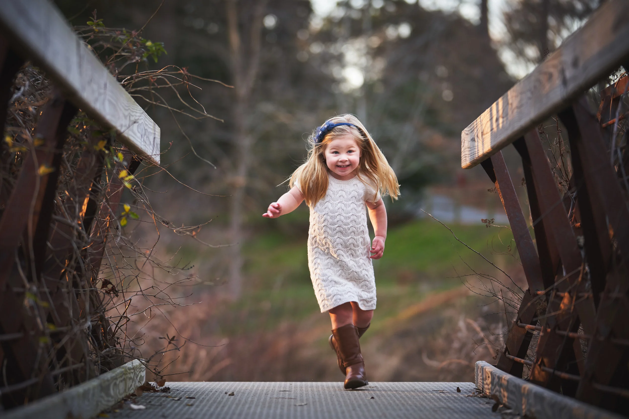 Girl Running in Clemson Botanical Gardens | Family Photo Session