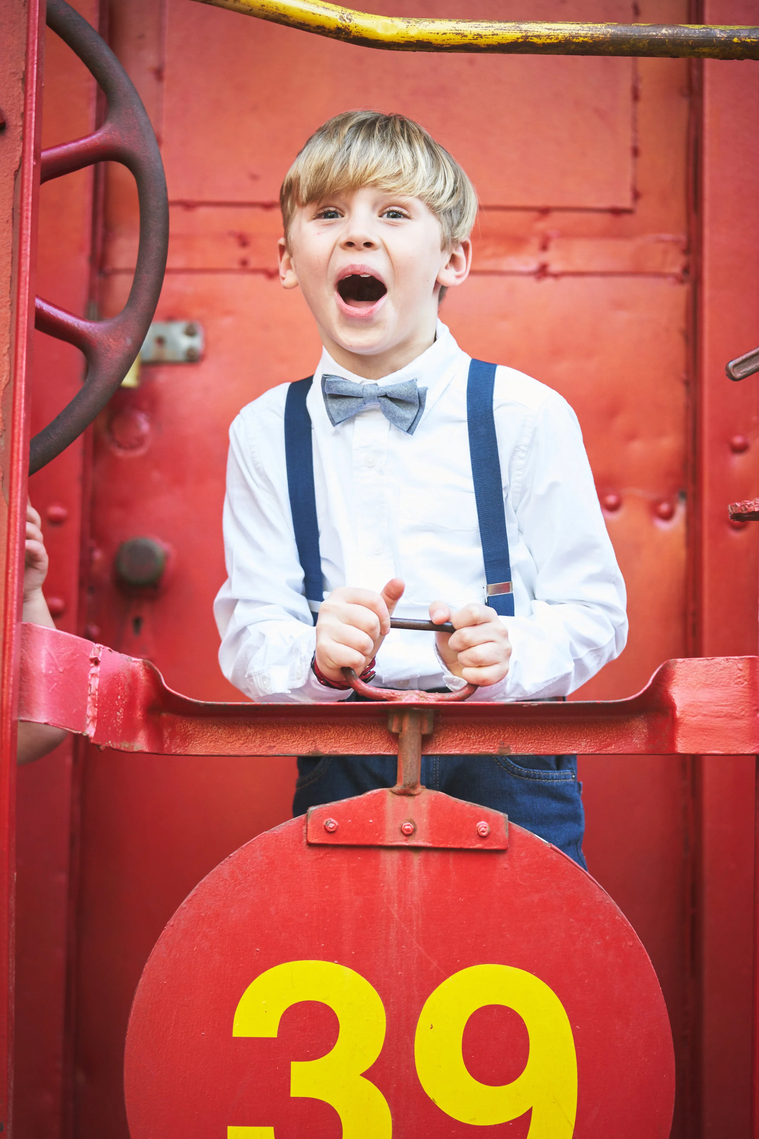 Boy on train| Family Photo Session at the Clemson Botanical Gardens