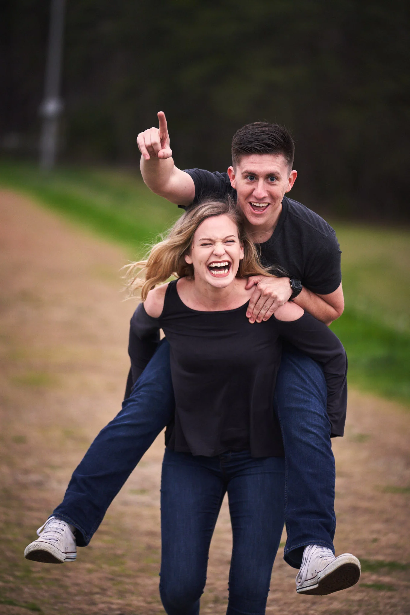 Couple piggyback ride | Engagement Session in Clemson, SC