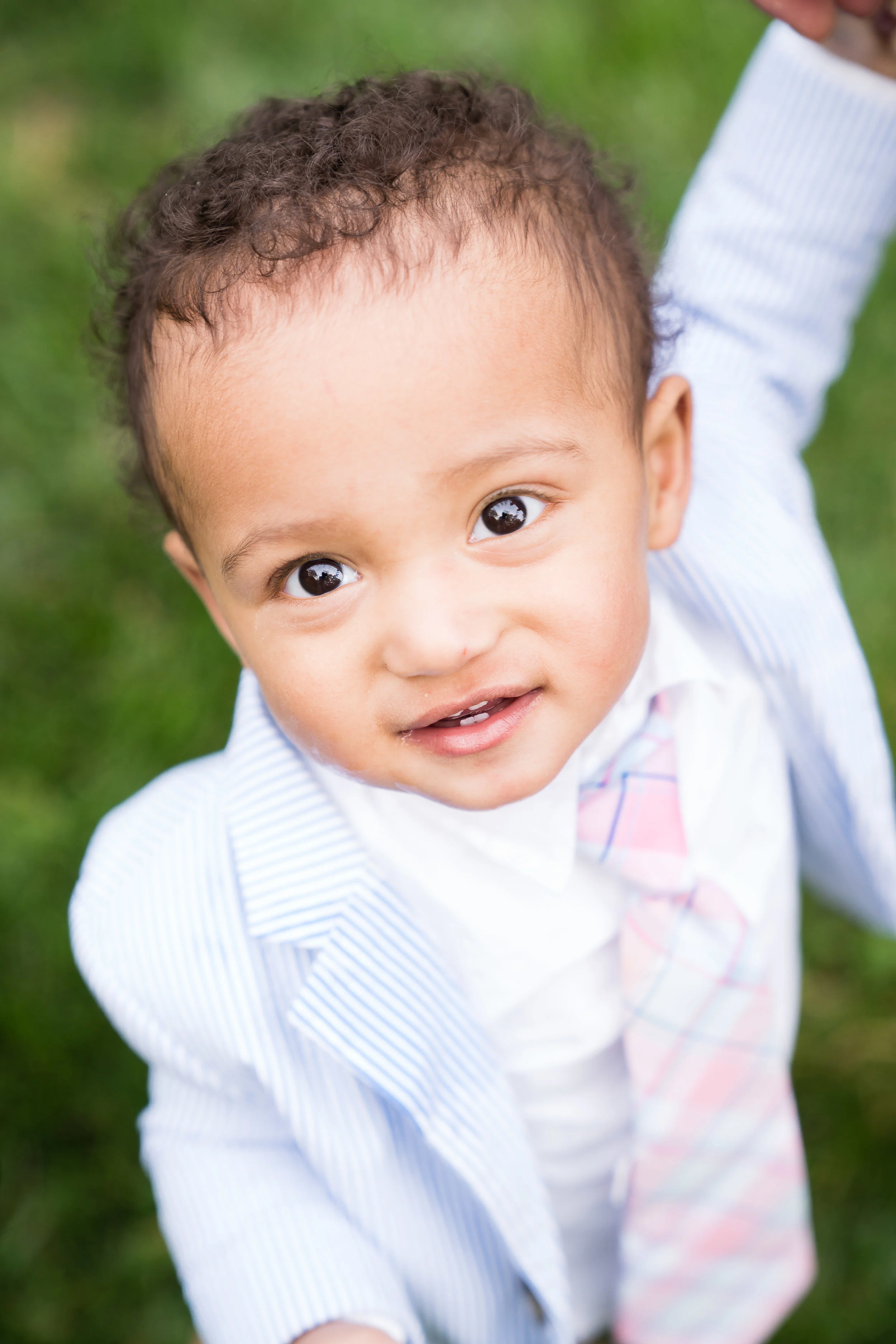 Toddler looking at camera family session | Anderson University