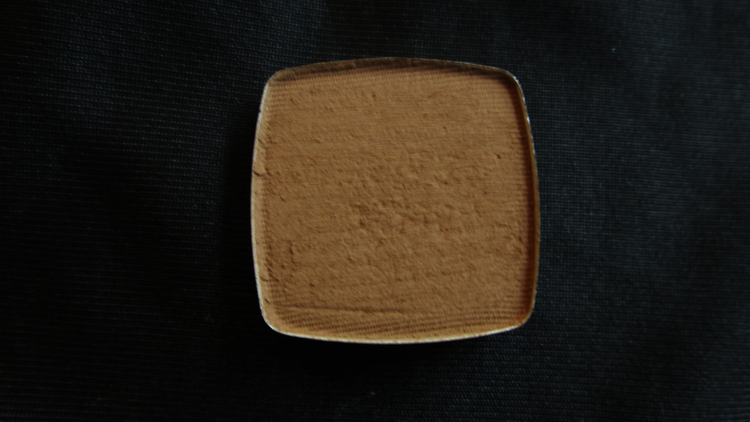 #32 A Corkable ( matte medium warm brown- a great base on warm deep skintones or as a transition shade for smokey eyes)