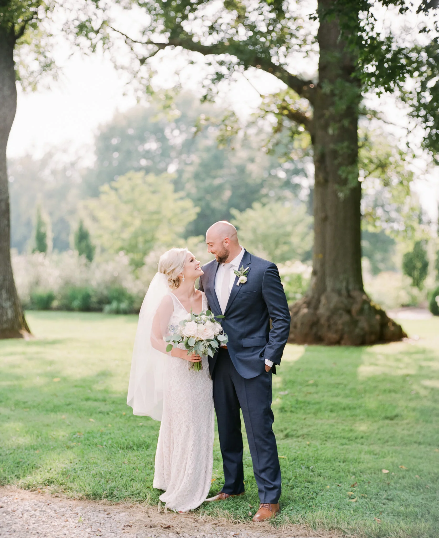 Bride and Groom with Bouquet taken with Pentax 67 Schneider Cinelux Ultra MC 120mm f/2