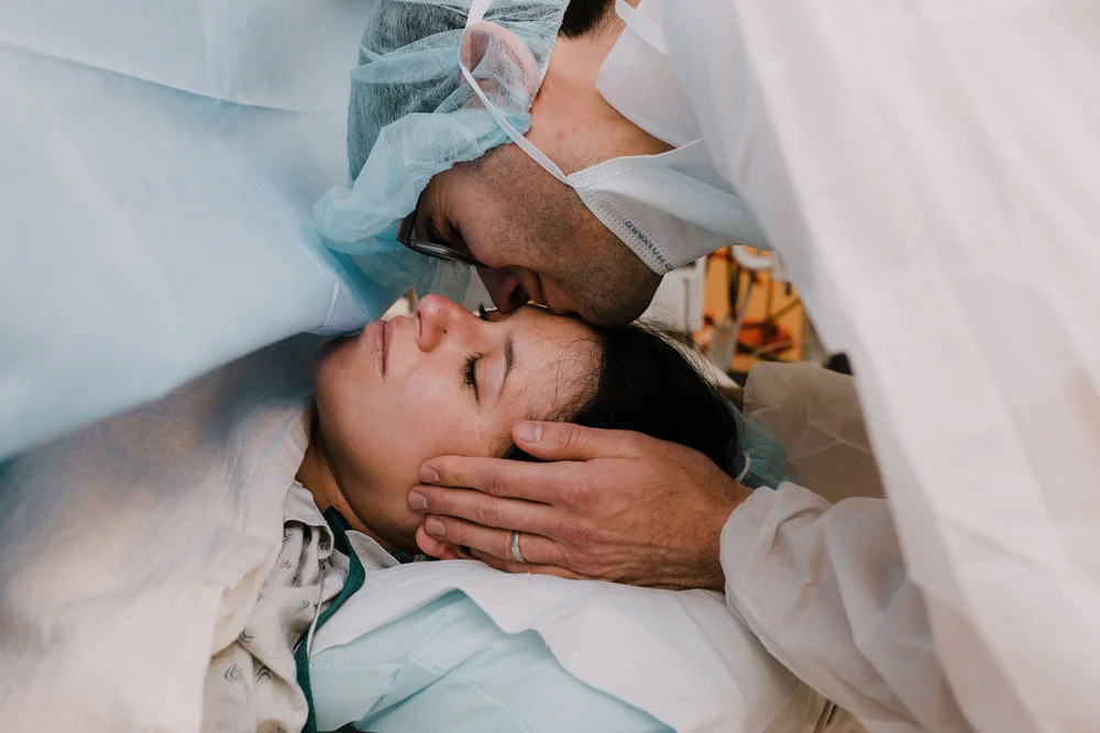 A mom is supported by her partner during a cesarean birth- Looks Like Film Feature
