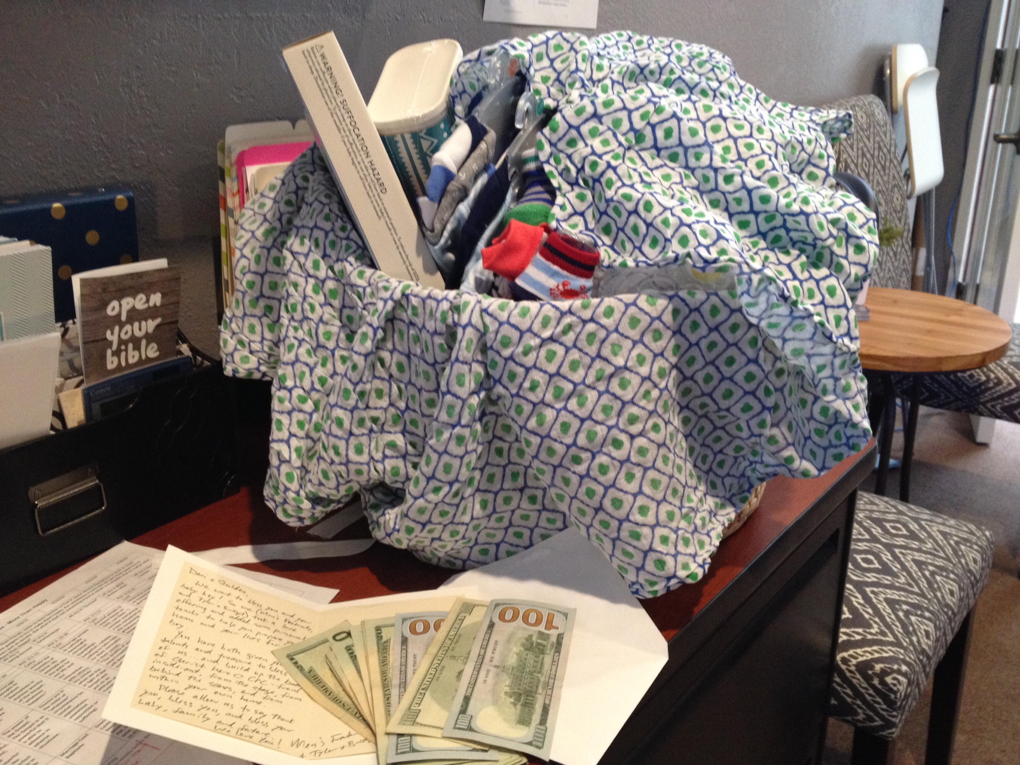 The thoughtful and generous monetary gift from Tyler's men's group and a basket full of goodies from Bridget! 