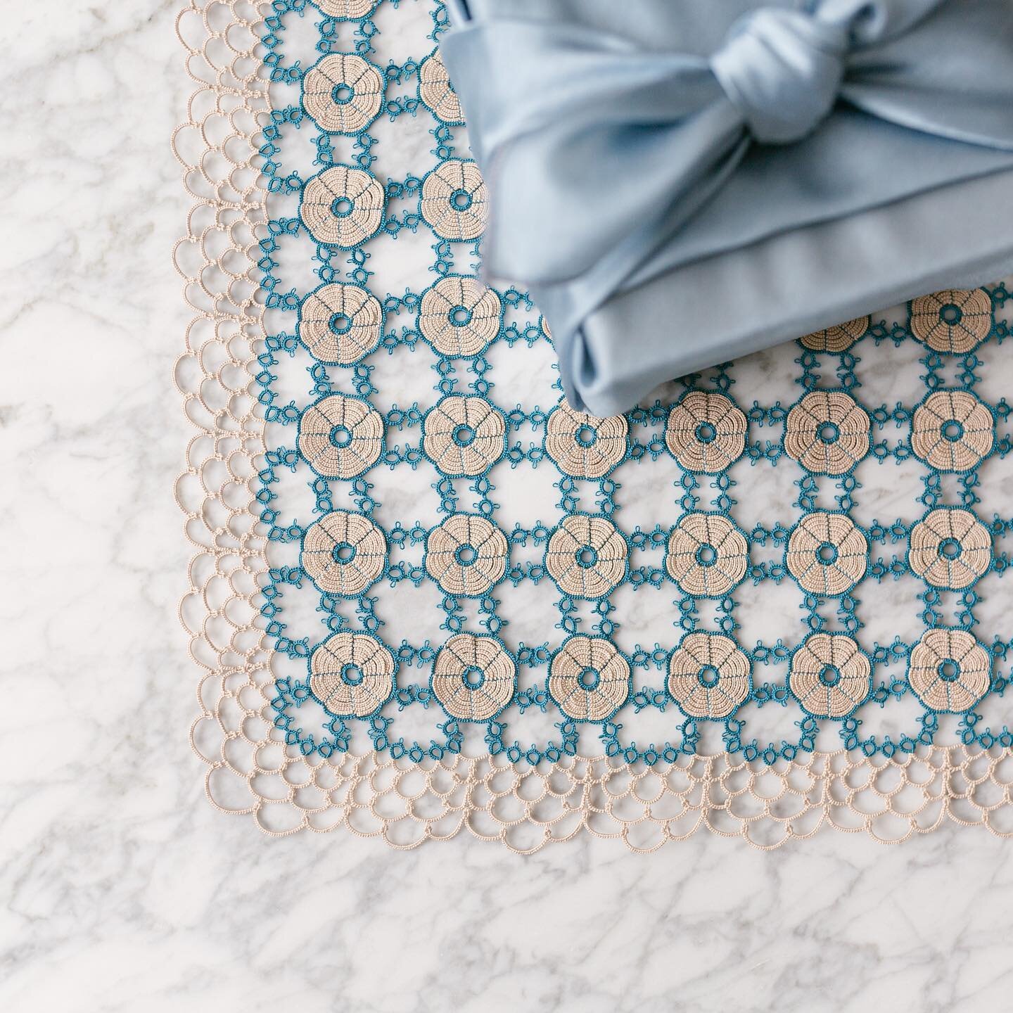 A gift wrapped with bojagi, pictured alongside the Bukchon Doily 6.