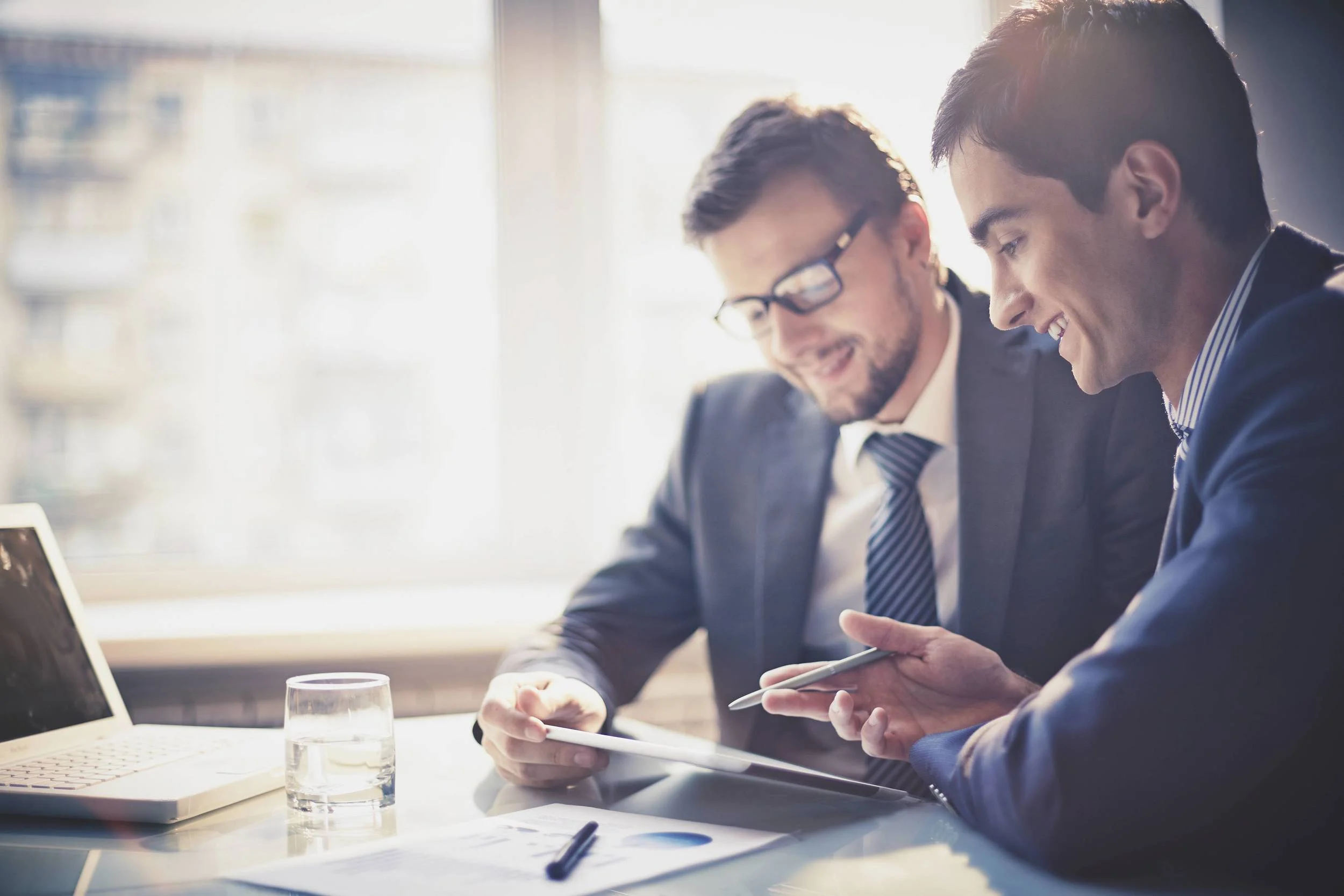 Small Two-businessmen-talking-while-looking-at-notes-000029245606_Full.jpg