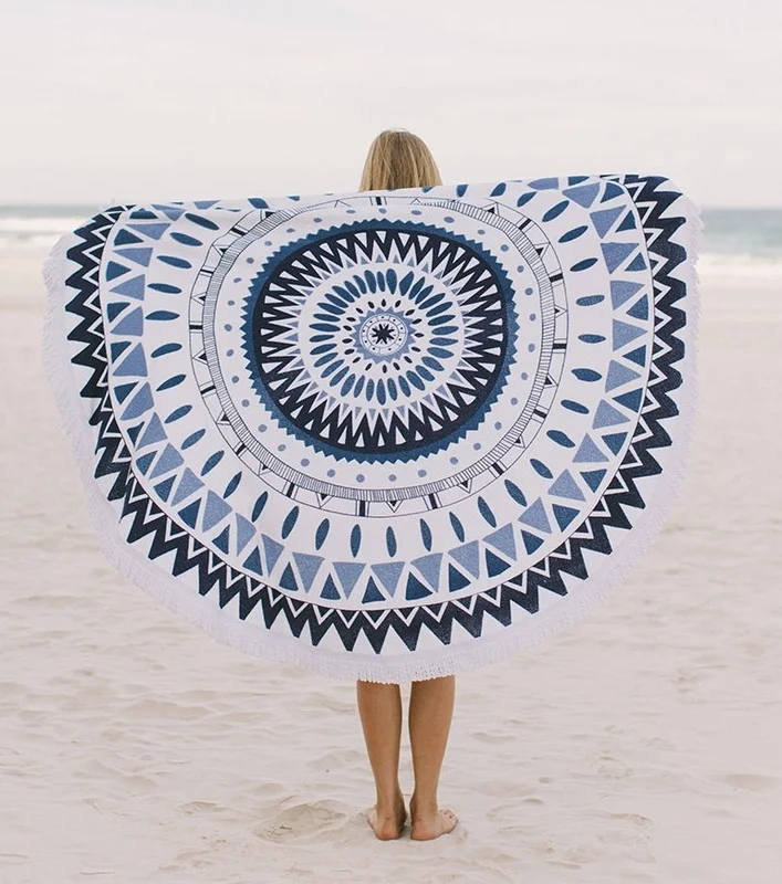 The Majorelle; inspired by the blue hues and exotic location of Yves Saint Laurent’s Moroccan Botanical gardens - exotic circular design with the original soft white tassel.