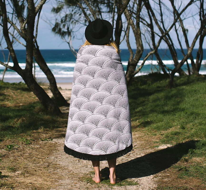 The Amaroo - a black dot fish scale pattern with a name that is Indigenous for ‘a beautiful place’. This sophisticated black & white design comes complete with a soft black tassel.