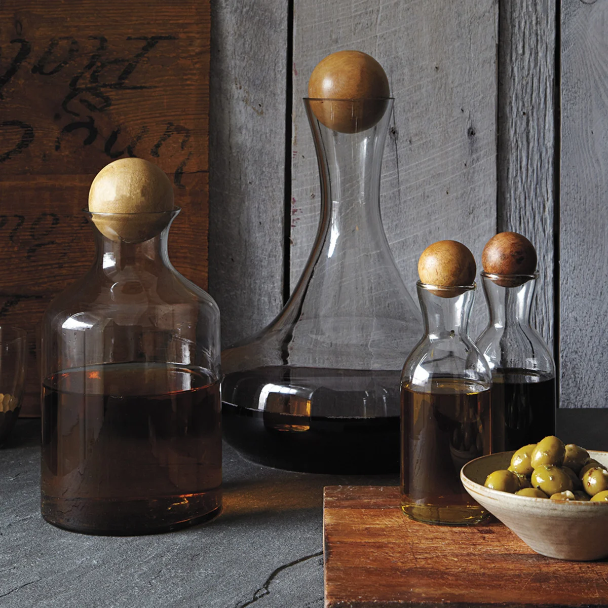 Glass bottles with wooden stoppers - West Elm