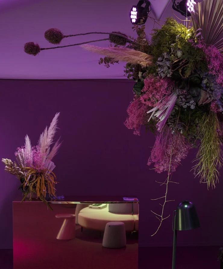 Shown above is the Softscape floor lamp available through L EN at Stylecraft . Floral arrangements by Flowers Vasette .