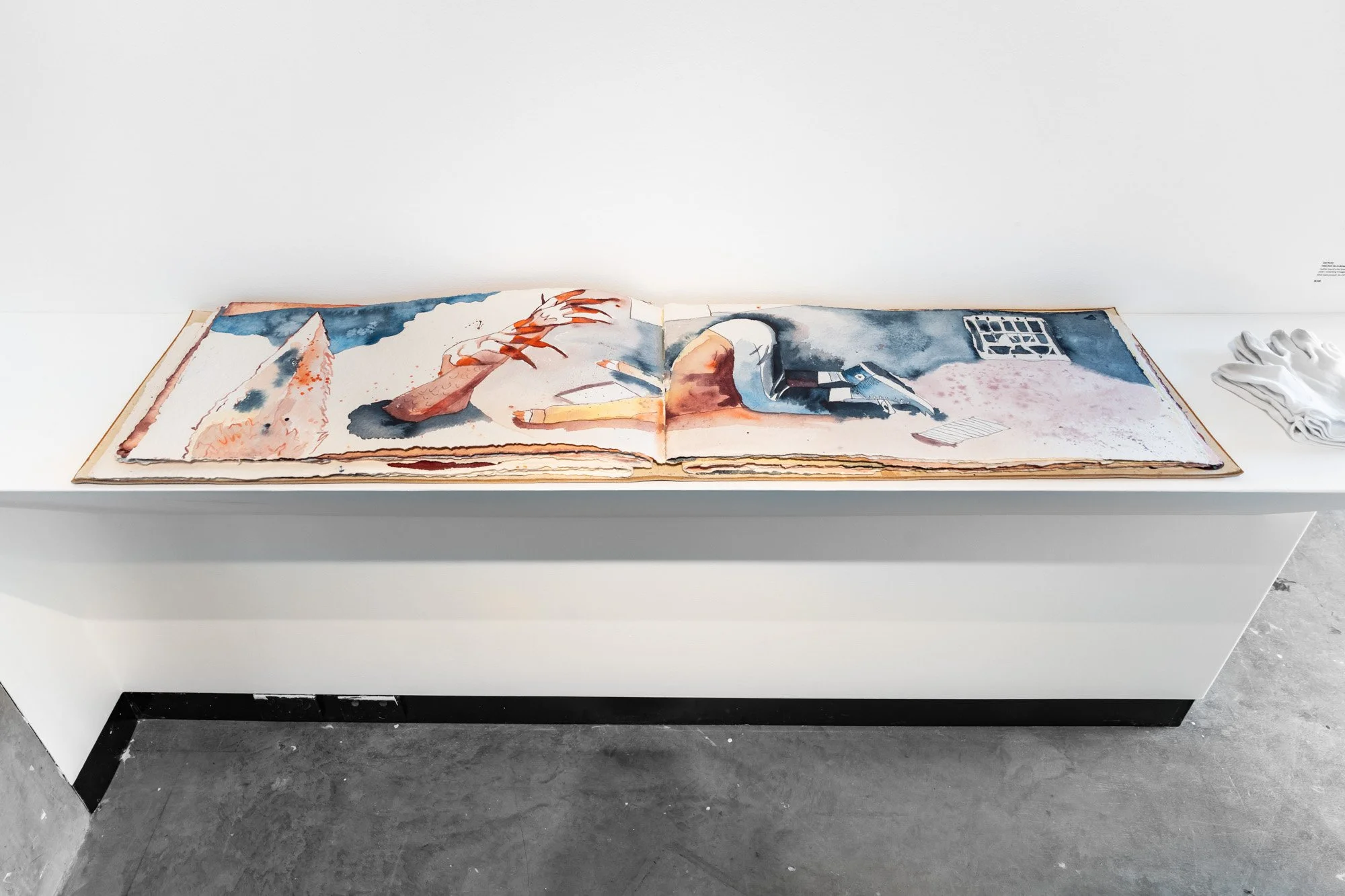  Tales from the In-Between, artist book. Installation image at Onespace 2026, exhibition in collaboration with Billie Wilson-Coffey (photographer) and Bridie Hooper. Image credit: Louis Lim.  