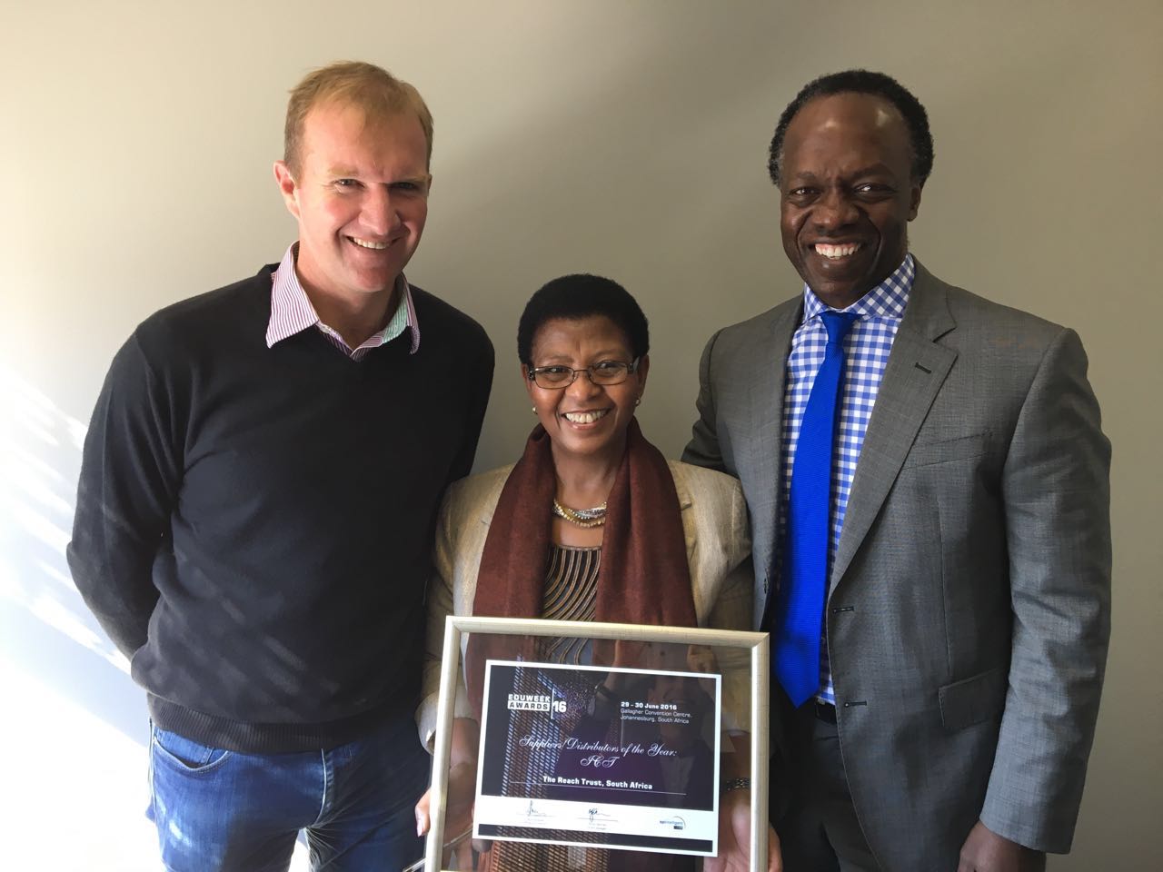 Andrew Rudge (CEO of Reach), Elizabeth Maepa (Trustee of Reach) and Sizwe Nxasana (Chairman of the FirstRand Foundation). 